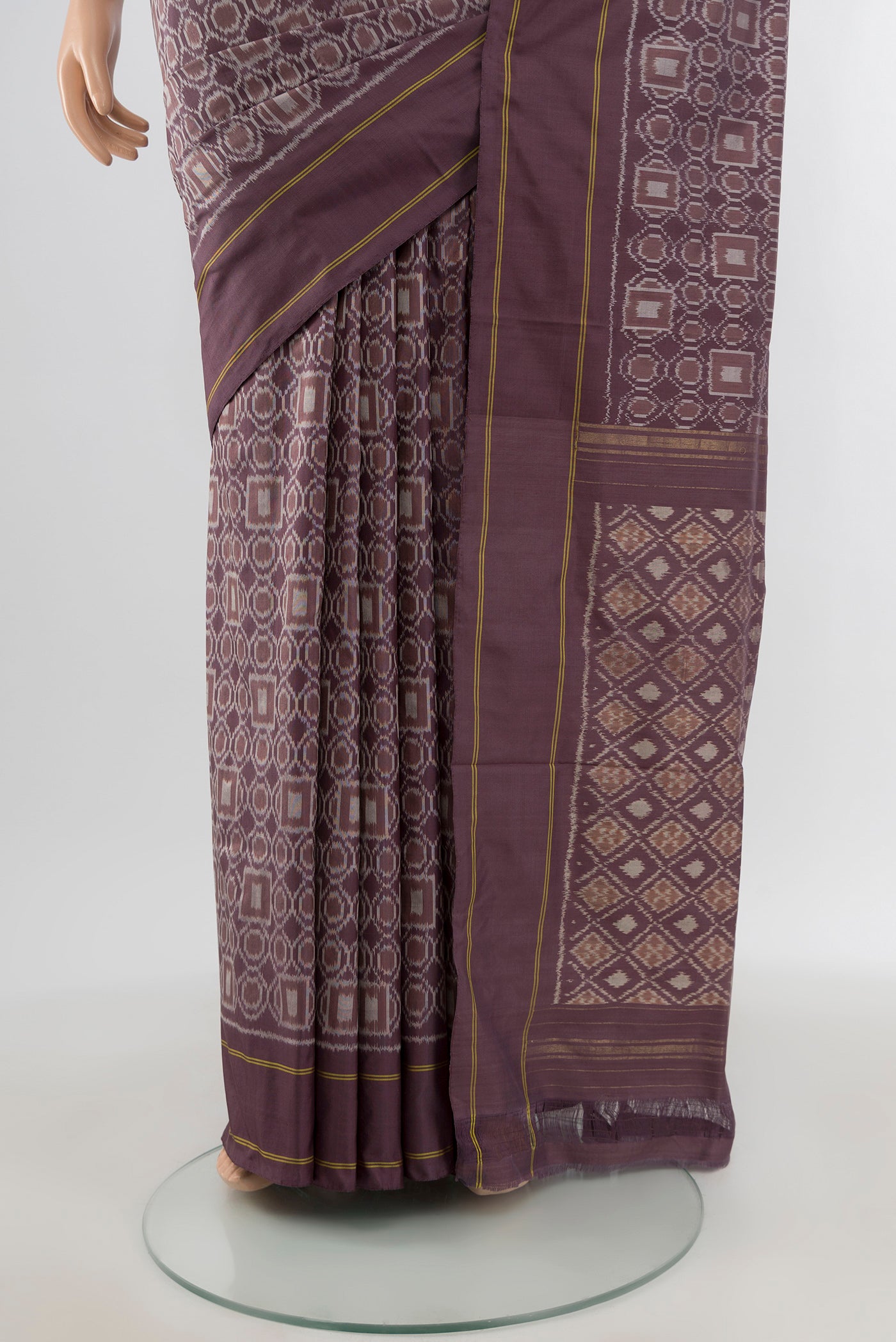 Pleats and pallu of Burgundy Pochampally Silk Saree with Ikat design on the body and Plain Border. 