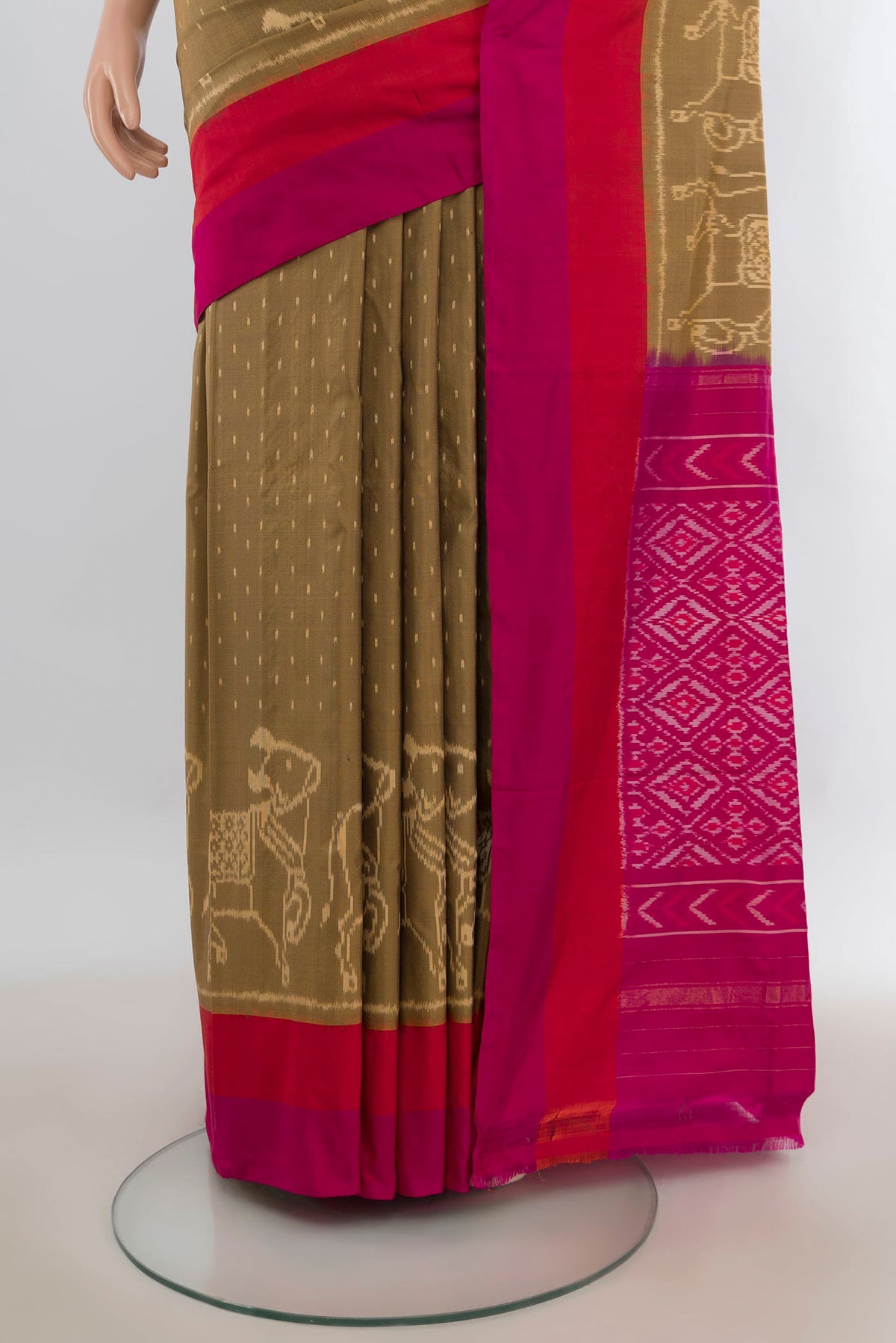 Pleats and pallu of Pure Silk Brown Pochampally Saree with Pure Ikat on the body and Plain Border. 