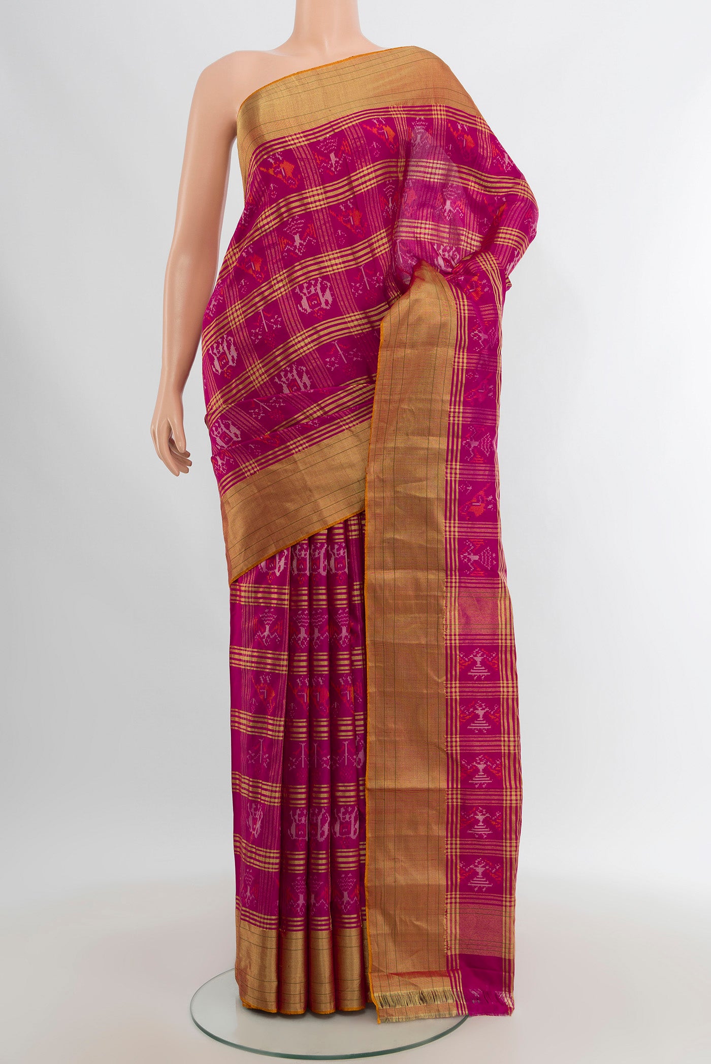 Magenta Pochampally Silk Saree with Checked design on the body and Zari Border.  displayed on a mannequin