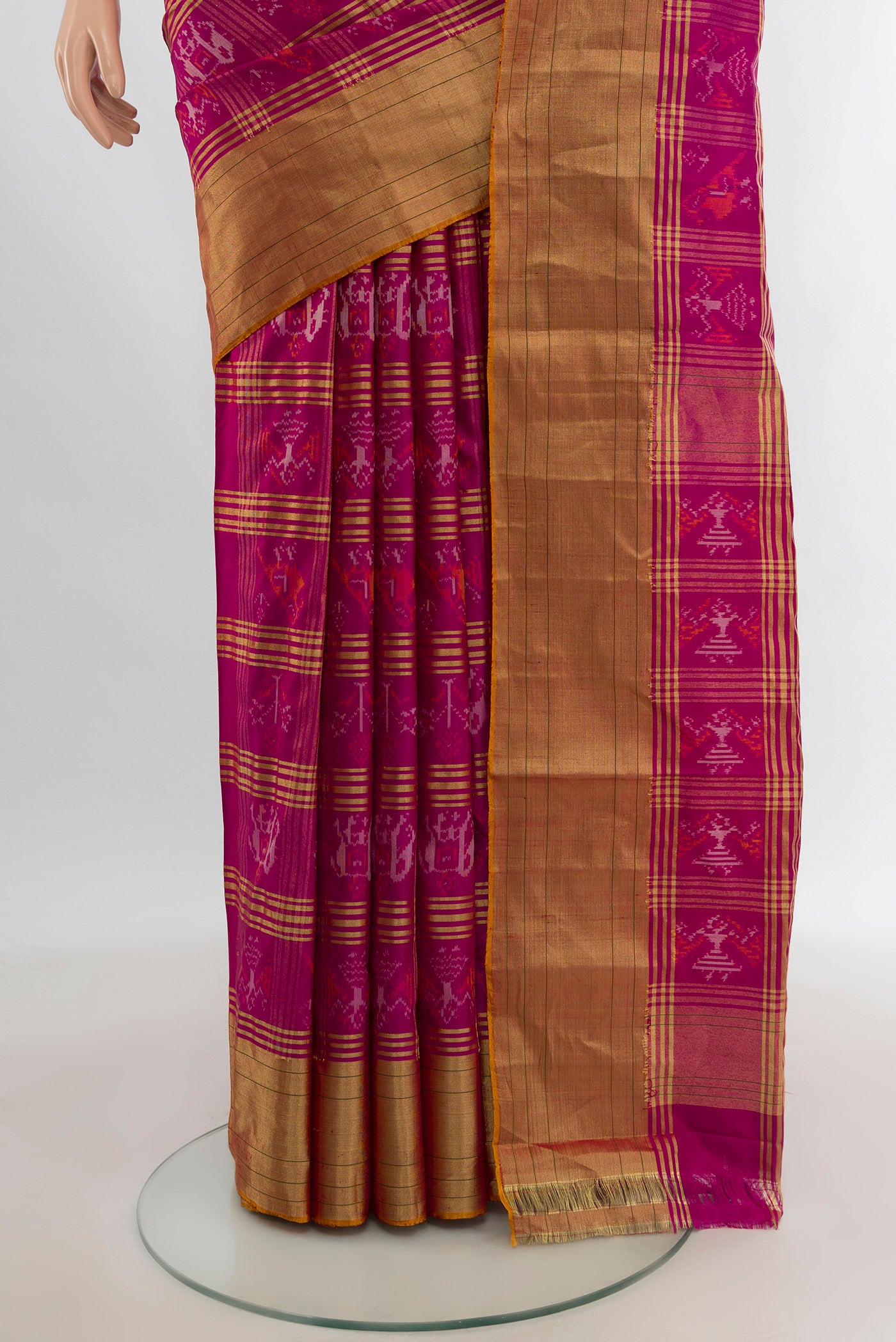 Pleats and pallu of Magenta Pochampally Silk Saree with Checked design on the body and Zari Border. 