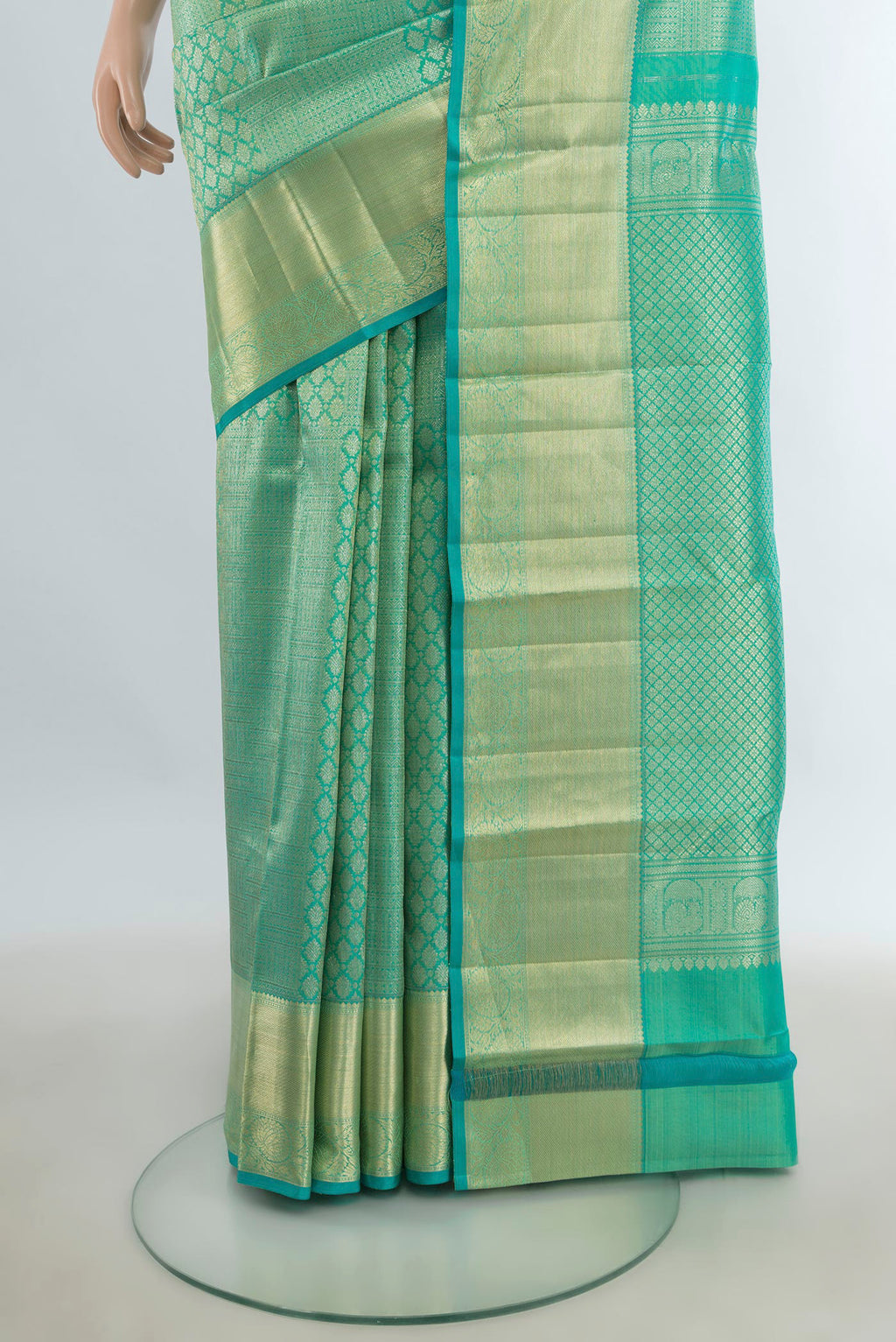 Pleats and pallu of Pure Silk Sea Green Kanchipuram Saree with Zari Brocade on the body and Zari Border. 