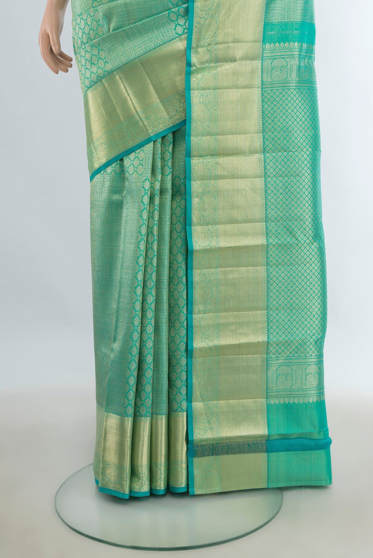 Pleats and pallu of Pure Silk Sea Green Kanchipuram Saree with Zari Brocade on the body and Zari Border. 