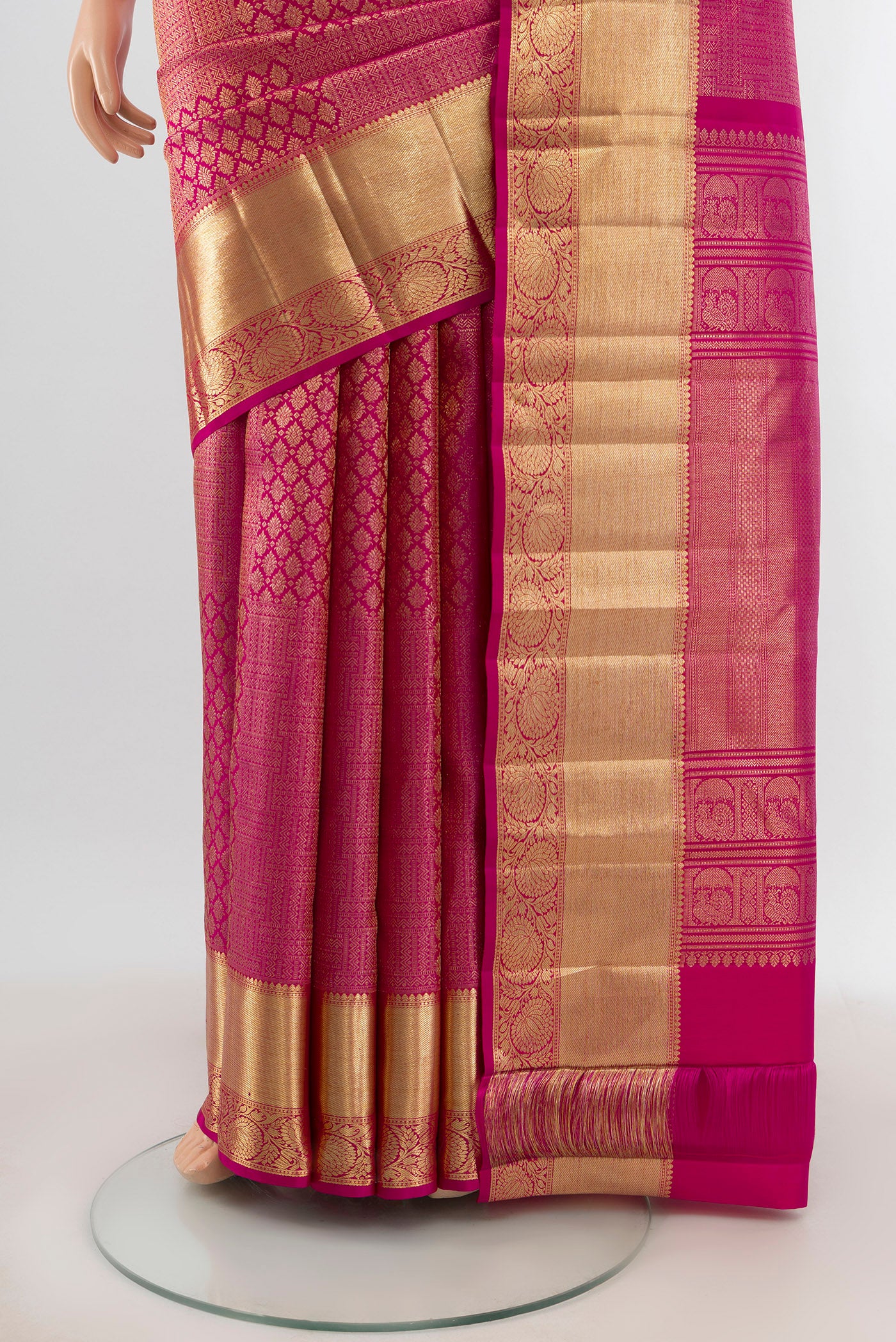 Pleats and pallu of Pink Kanchipuram Silk Saree with Zari Brocade on the body and Zari Border. 