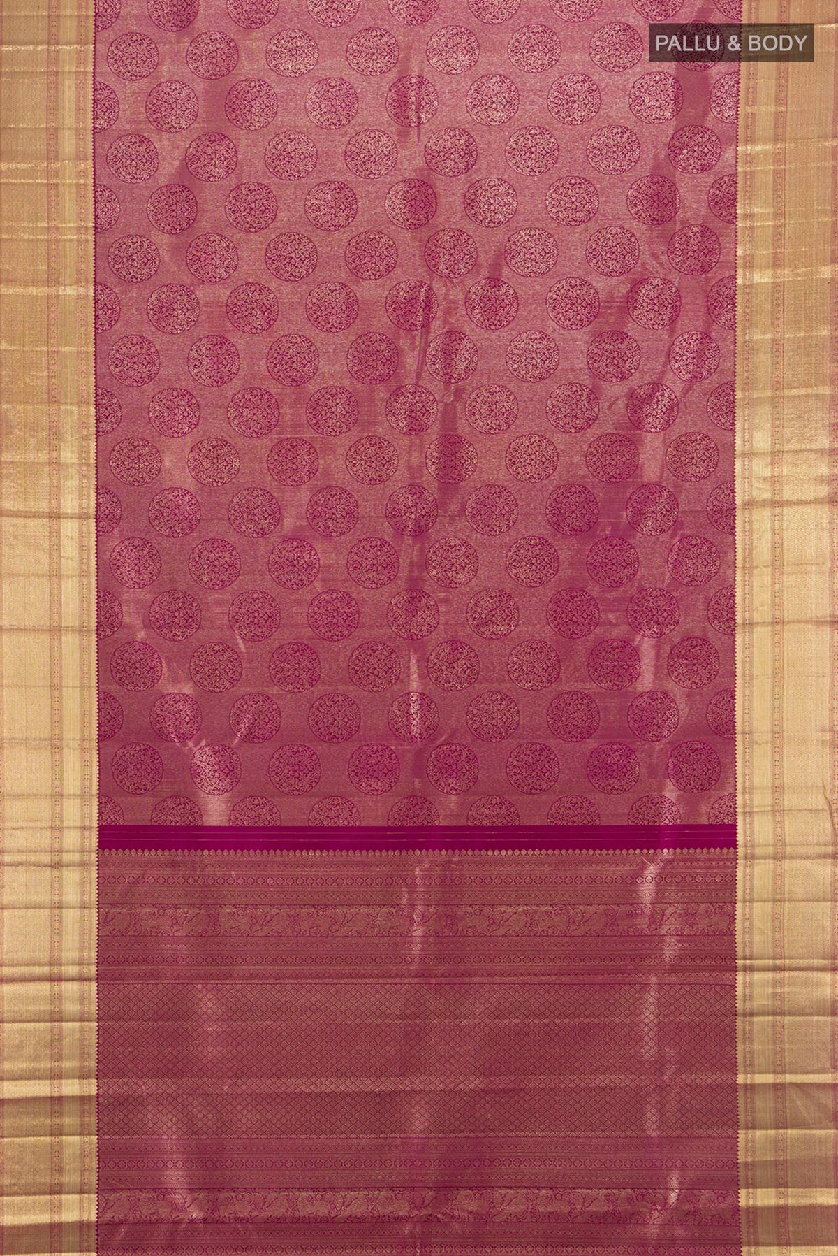 Flat view of Magenta Kanchipuram Silk Saree with Zari Brocade on the body and Zari Border. 