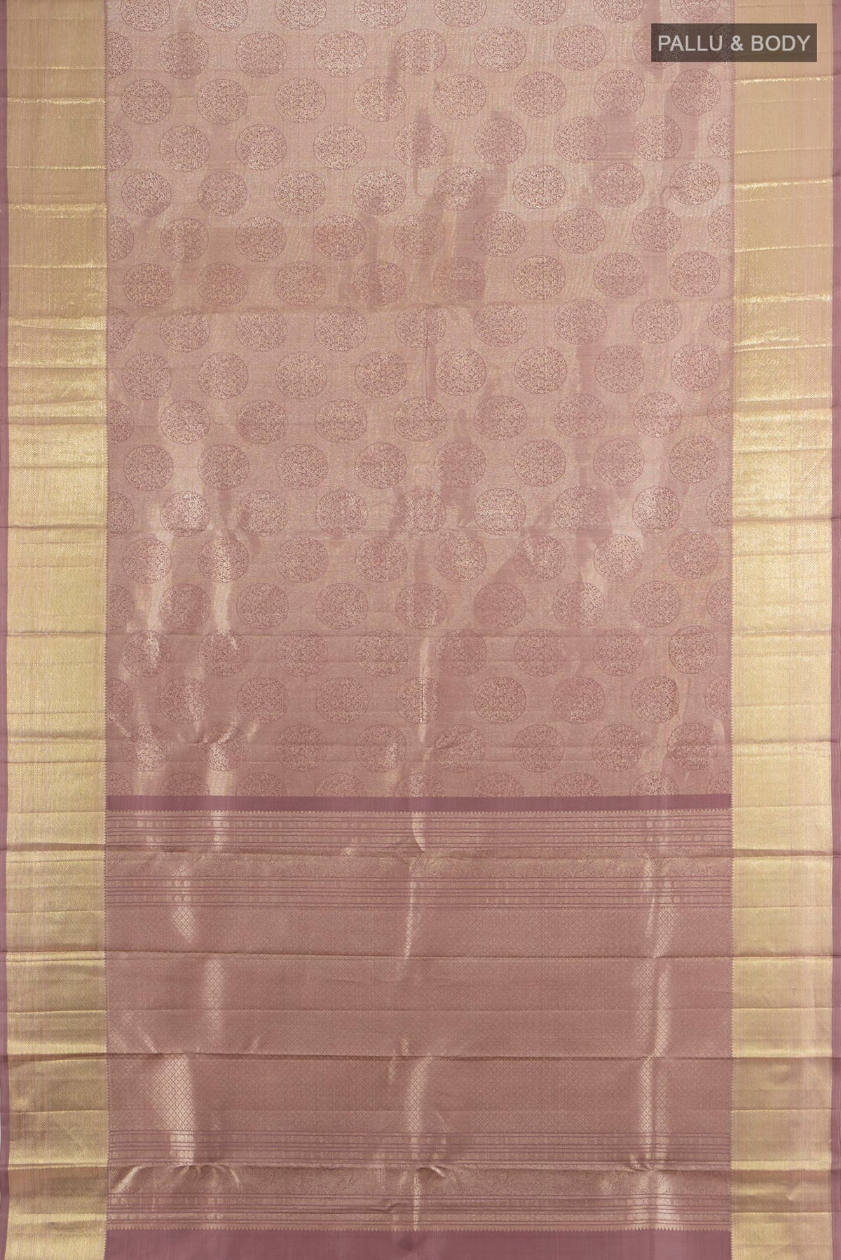 Flat view of Pure Silk Bronze Kanchipuram Saree with Zari Butta on the body and Silk Border. 