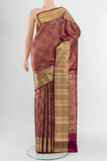 Maroon Kanchipuram Silk Saree with Zari Brocade on the body and Zari Border.  displayed on a mannequin