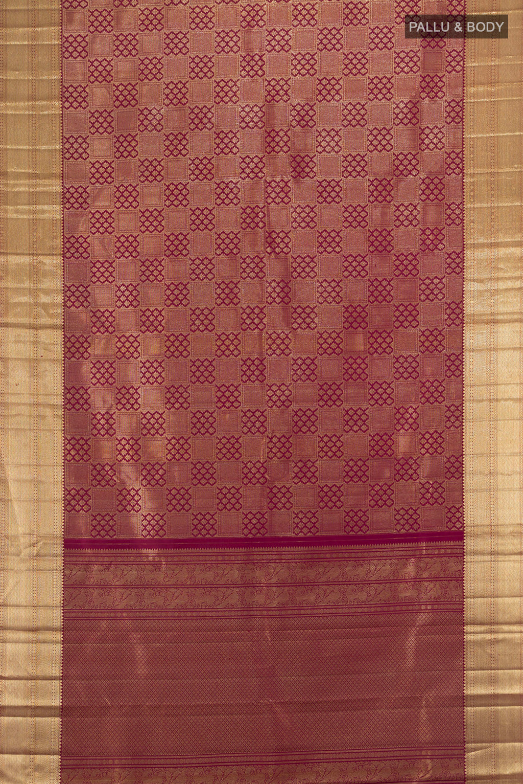 Flat view of Maroon Kanchipuram Silk Saree with Zari Brocade on the body and Zari Border. 