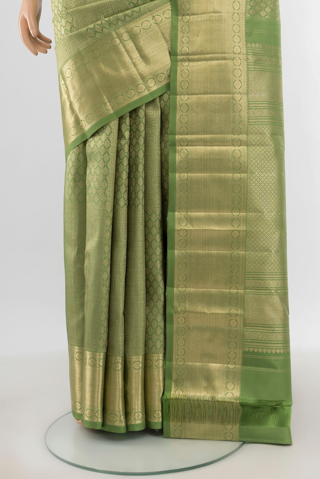 Pleats and pallu of Sage Green Kanchipuram Silk Saree with Zari Brocade on the body and Zari Border. 