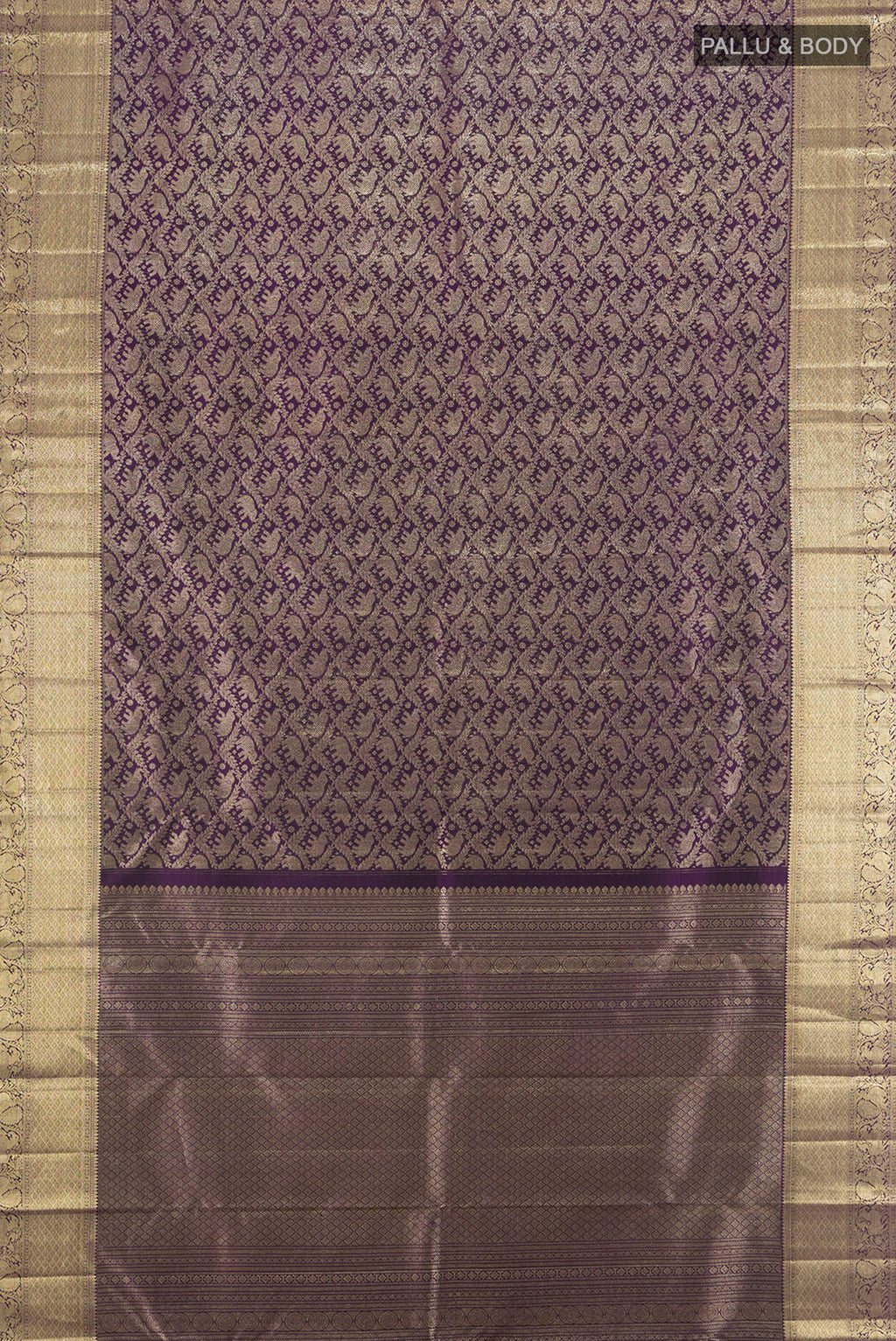 Flat view of Violet Kanchipuram Silk Saree with Zari Brocade on the body and Zari Border. 