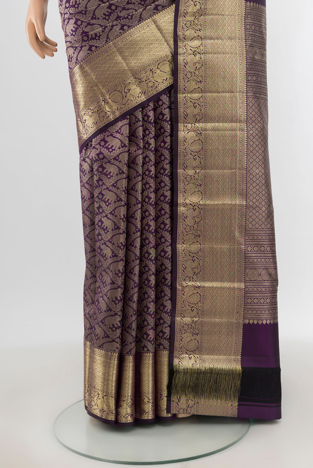 Pleats and pallu of Violet Kanchipuram Silk Saree with Zari Brocade on the body and Zari Border. 