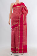 Dark Pink Kanchipuram Silk Saree with Zari Brocade on the body and Zari Border.  displayed on a mannequin