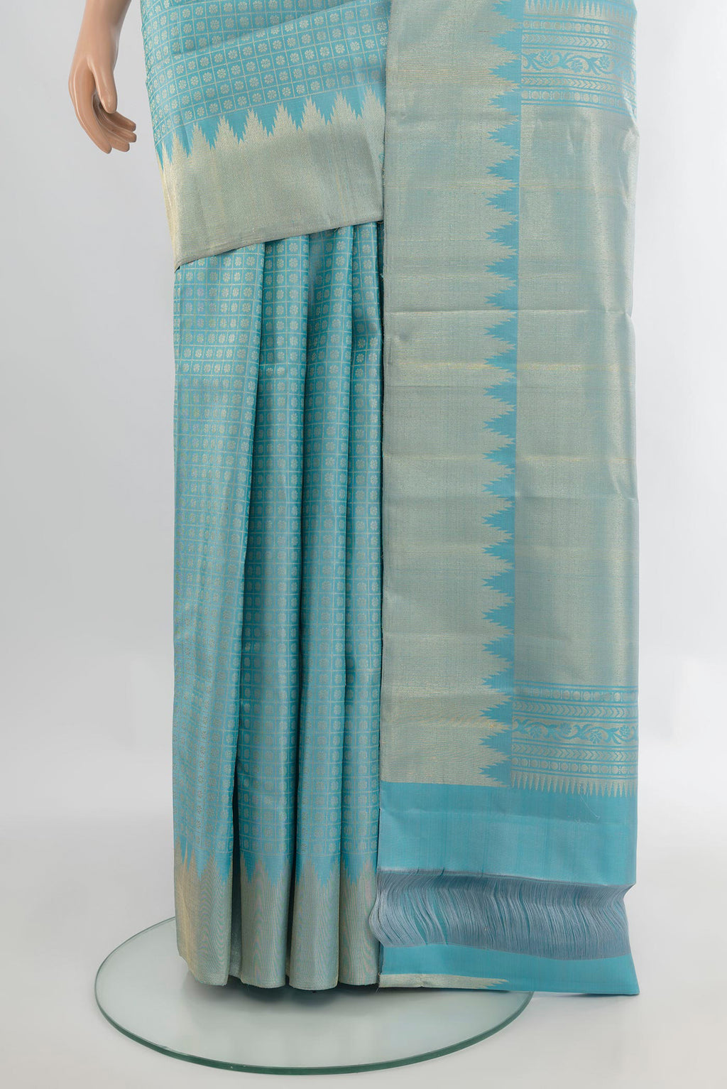 Pleats and pallu of Pure Silk Sky Blue Kanchipuram Saree with Zari Butta on the body and Zari Border. 