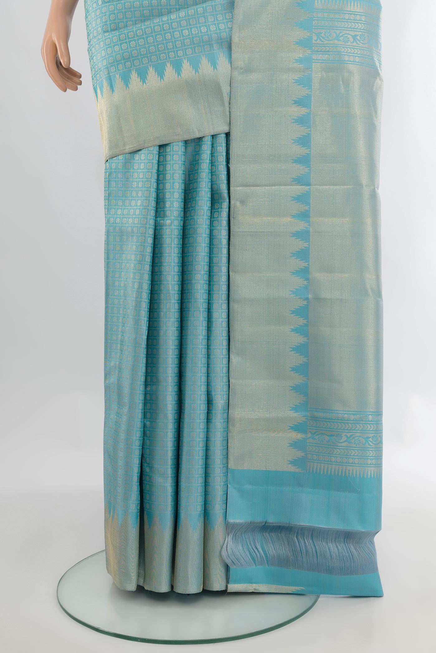 Pleats and pallu of Pure Silk Sky Blue Kanchipuram Saree with Zari Butta on the body and Zari Border. 