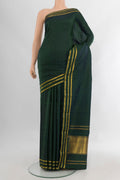 Bottle Green Kanchipuram Silk Saree with Plain Body and Zari Border.  displayed on a mannequin
