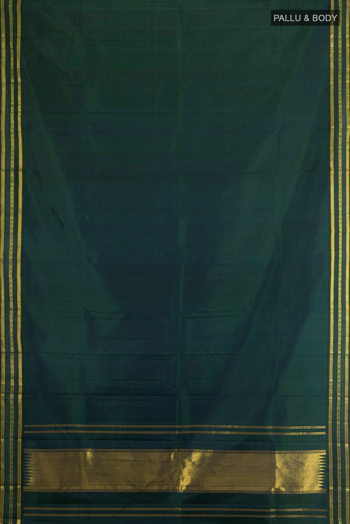 Flat view of Bottle Green Kanchipuram Silk Saree with Plain Body and Zari Border. 