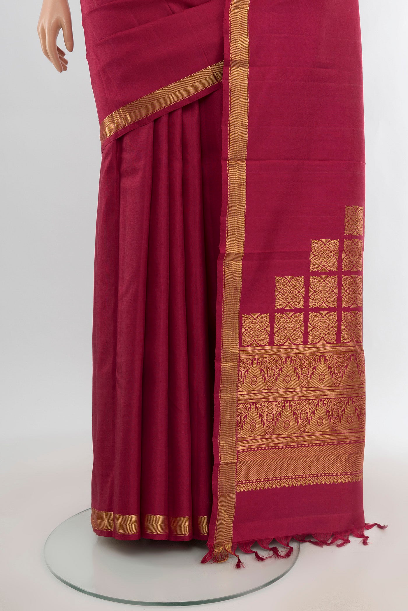 Pleats and pallu of Pure Silk Pure Zari Maroon Kanjivaram Saree with Plain Body and Zari Border. 