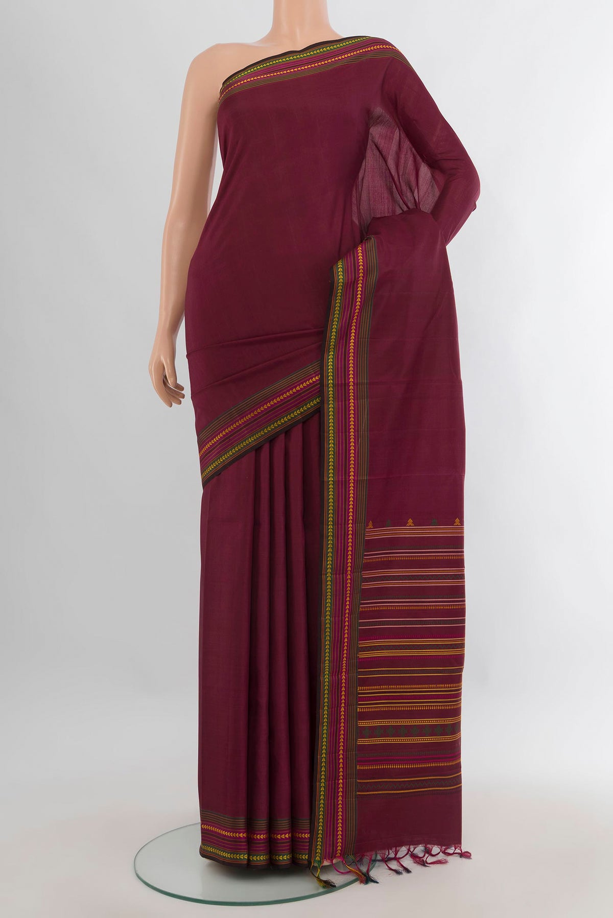 Pure Silk Maroon Kanchipuram Saree with Plain Body and Thread Border.  displayed on a mannequin