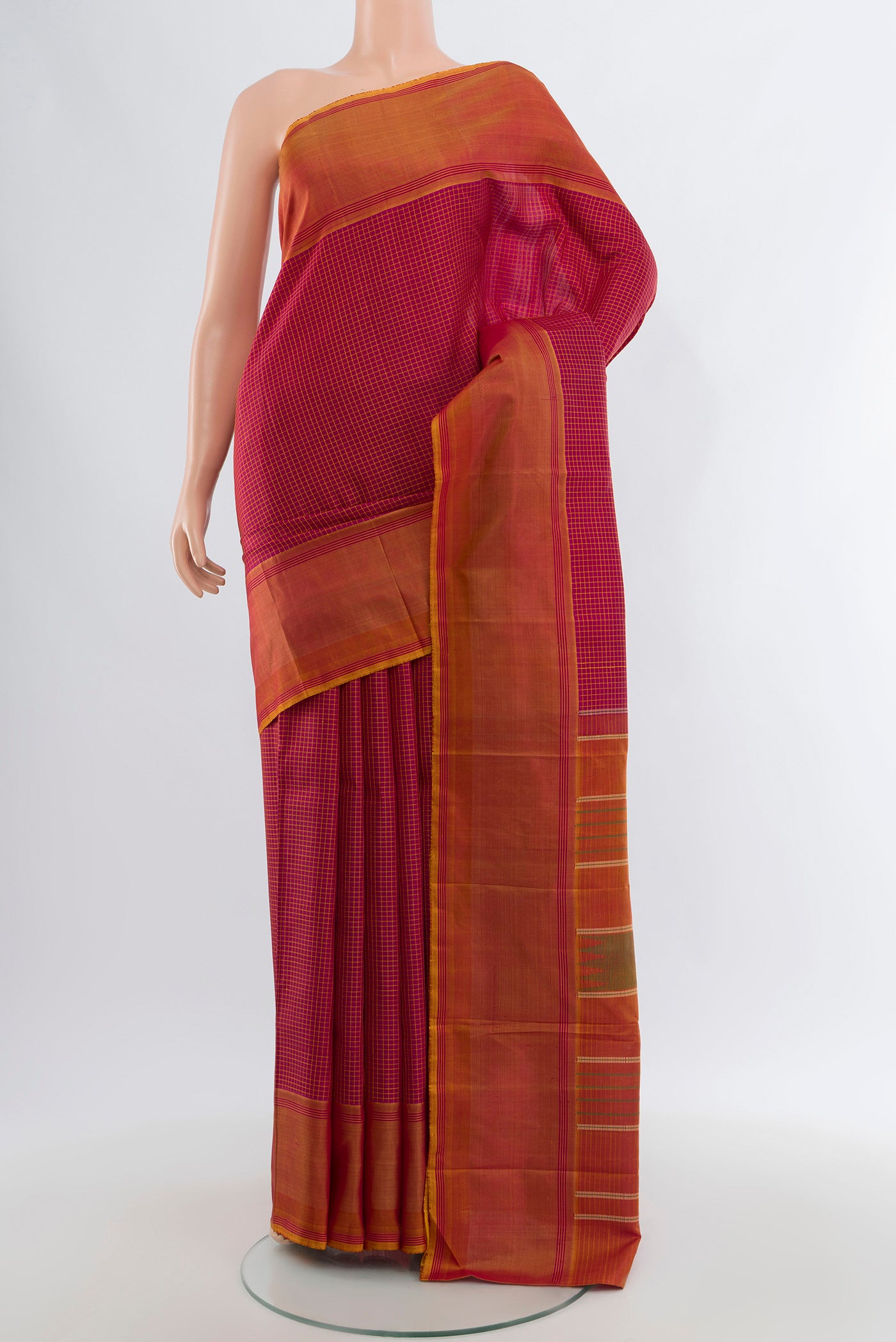 Maroon Kanchipuram Silk Saree with Checked design on the body and Thread Border.  displayed on a mannequin