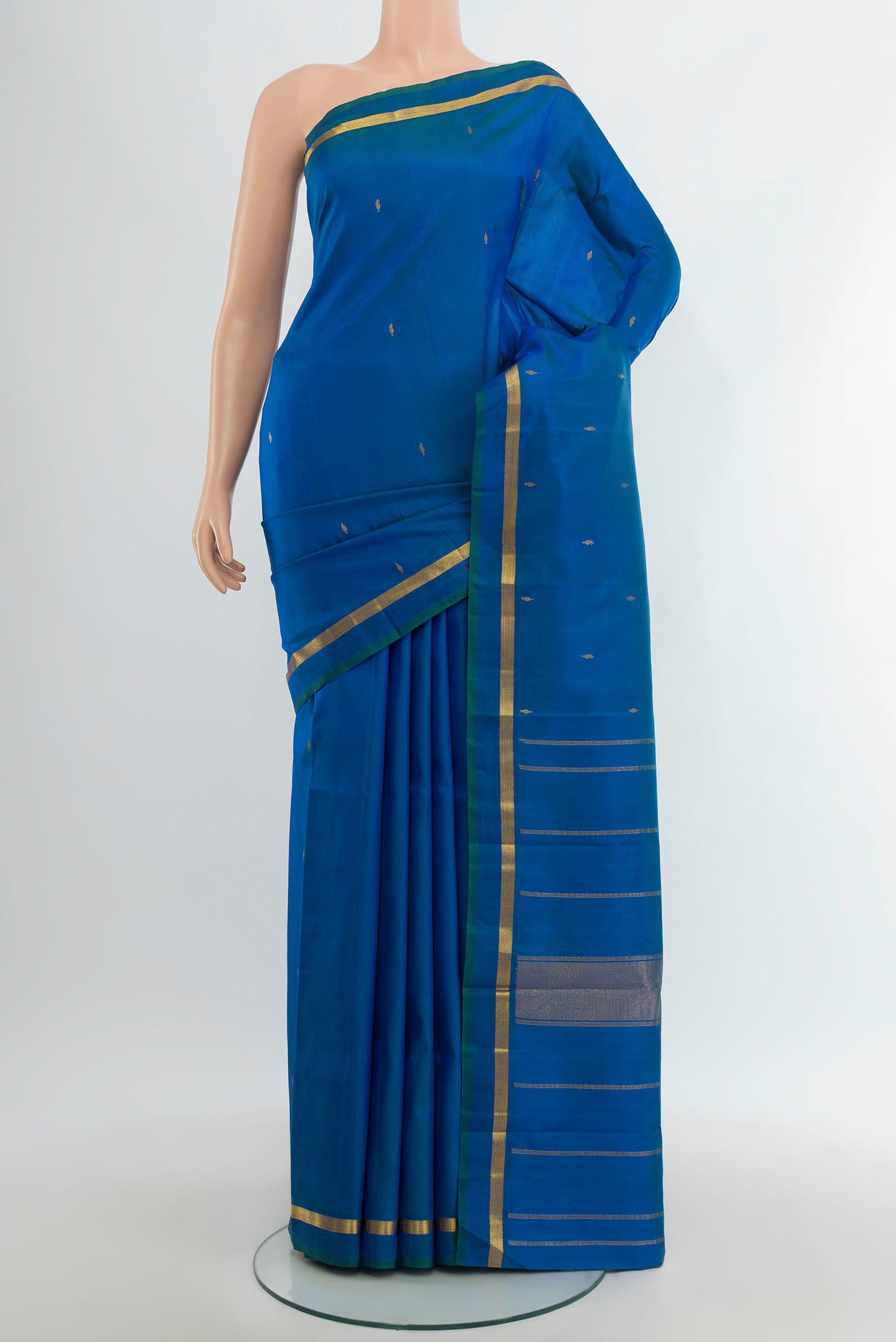 Royal Blue Kanchipuram Silk Saree with Zari Butta on the body and Zari Border.  displayed on a mannequin