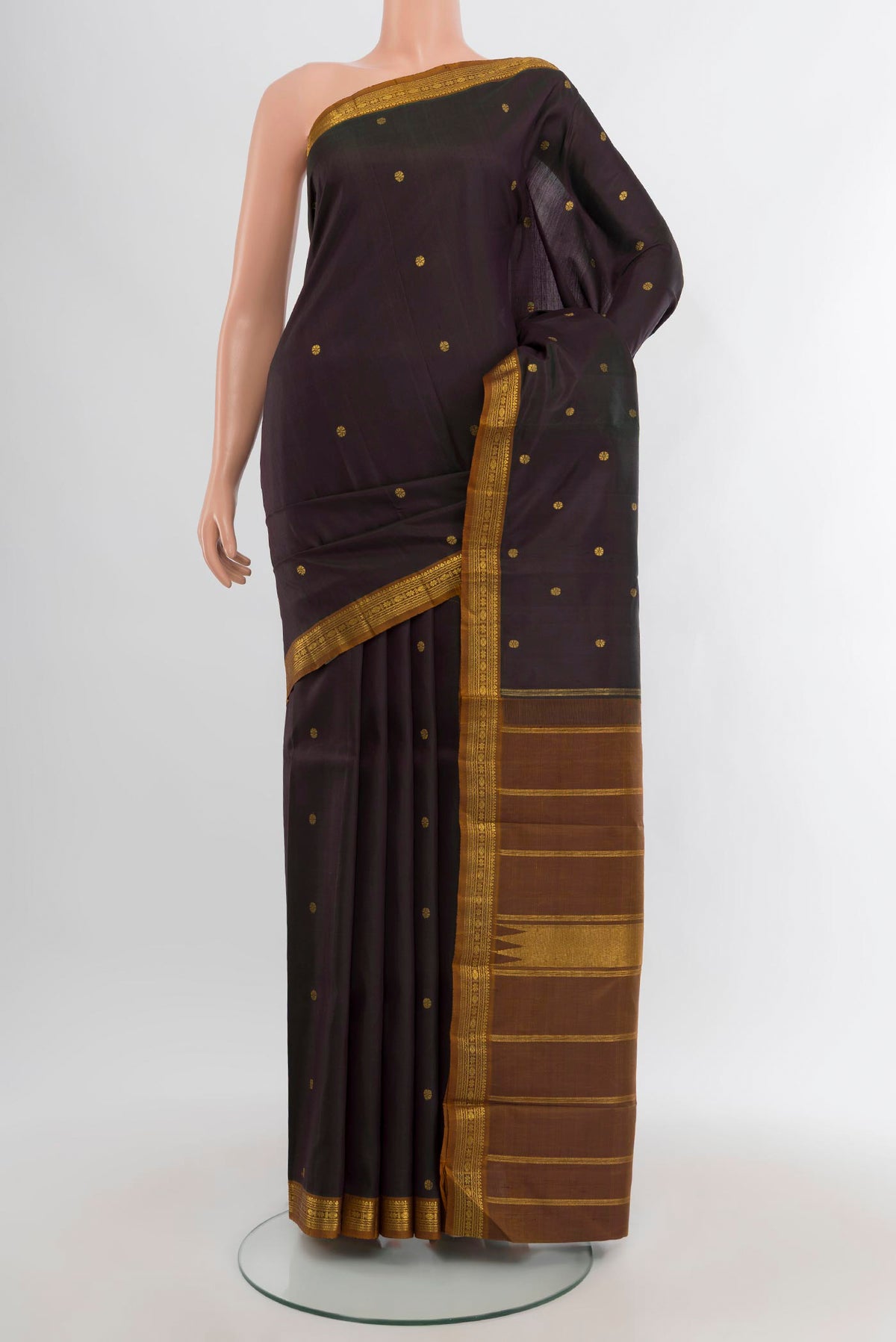 Black Kanchipuram Silk Saree with Plain Body and Zari Border.  displayed on a mannequin