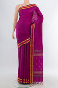 Purple Kanchipuram Silk Saree with Plain Body and Zari Border.  displayed on a mannequin