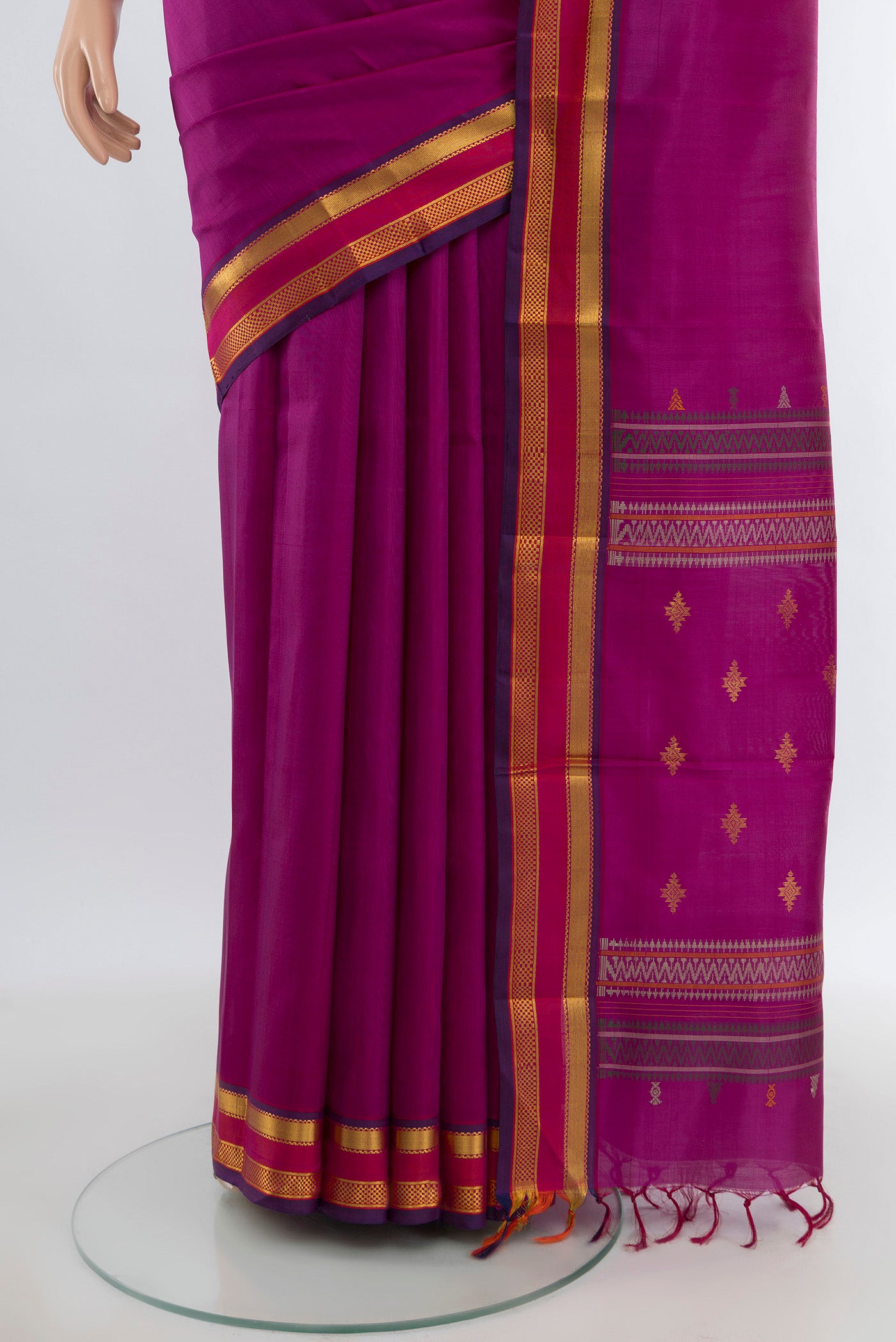 Pleats and pallu of Purple Kanchipuram Silk Saree with Plain Body and Zari Border. 