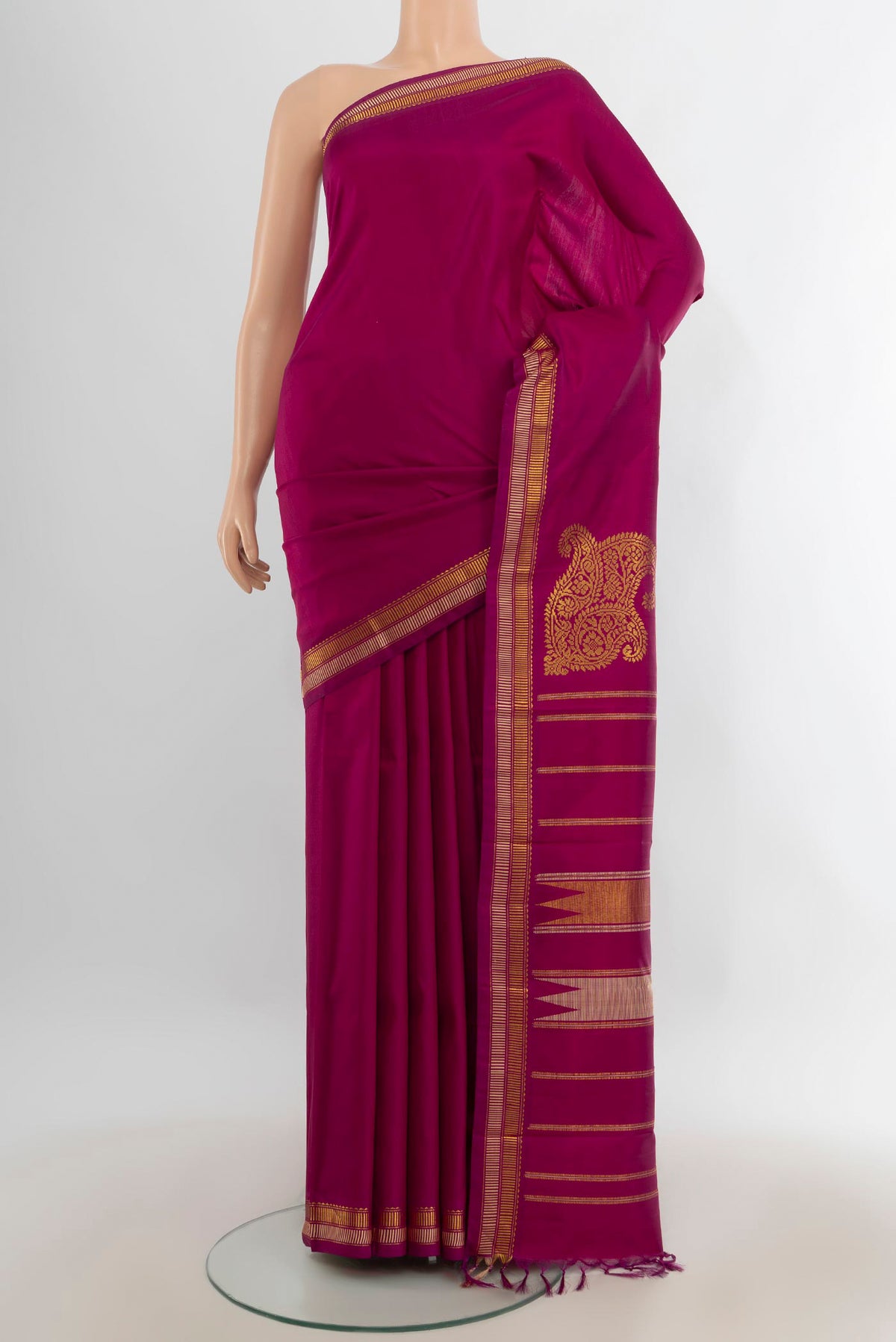 Pure Silk Pure Zari Purple Kanchipuram Saree with Plain Body and Silk Border.  displayed on a mannequin