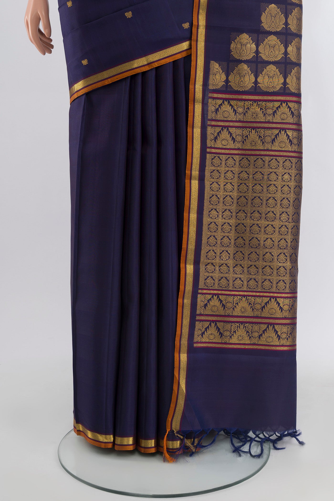 Pleats and pallu of Navy Blue Kanjivaram Silk Saree with Zari Butta on the body and Zari Border. 