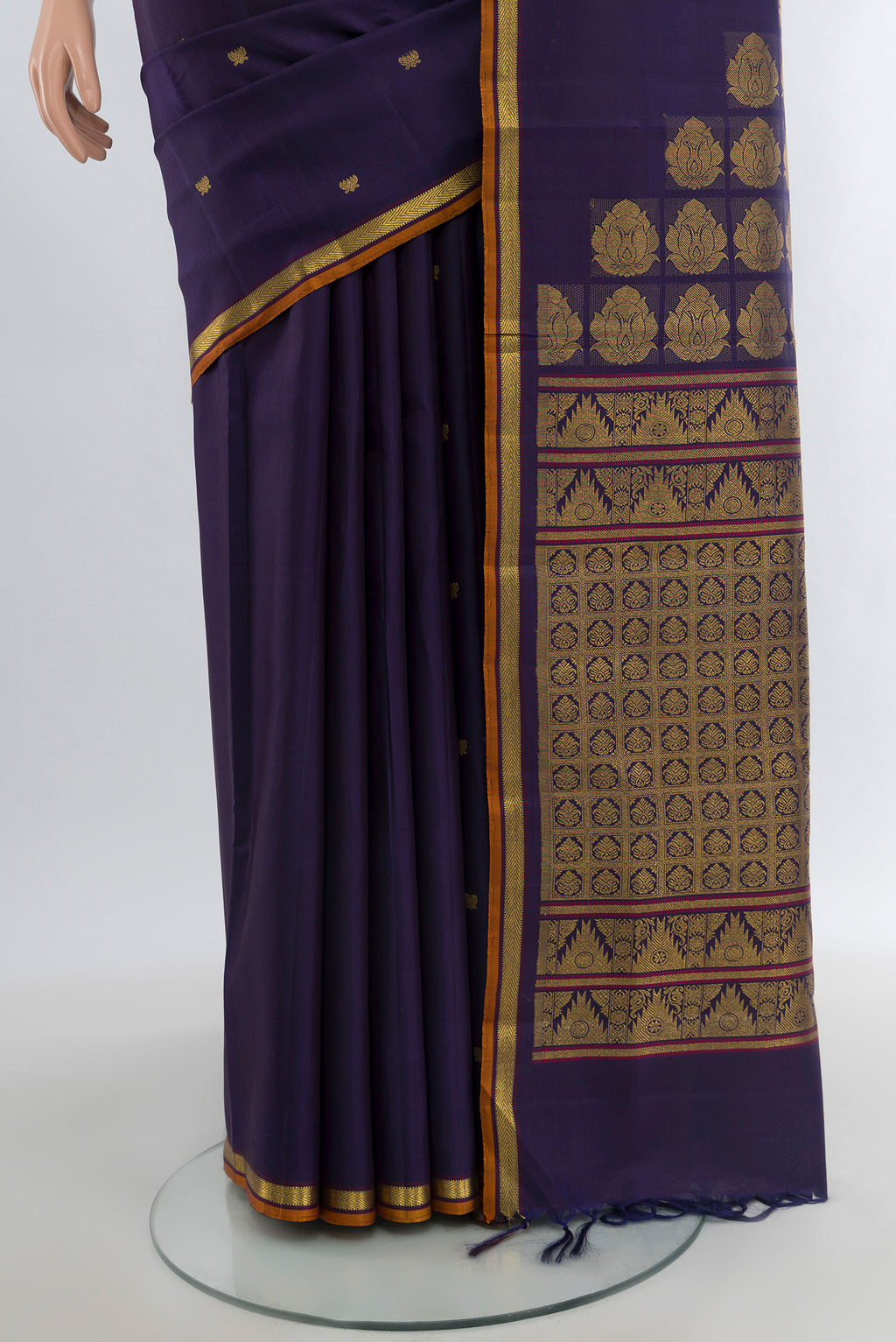 Pleats and pallu of Pure Silk Pure Zari Navy Blue Kanjivaram Saree with Zari Butta on the body and Zari Border. 