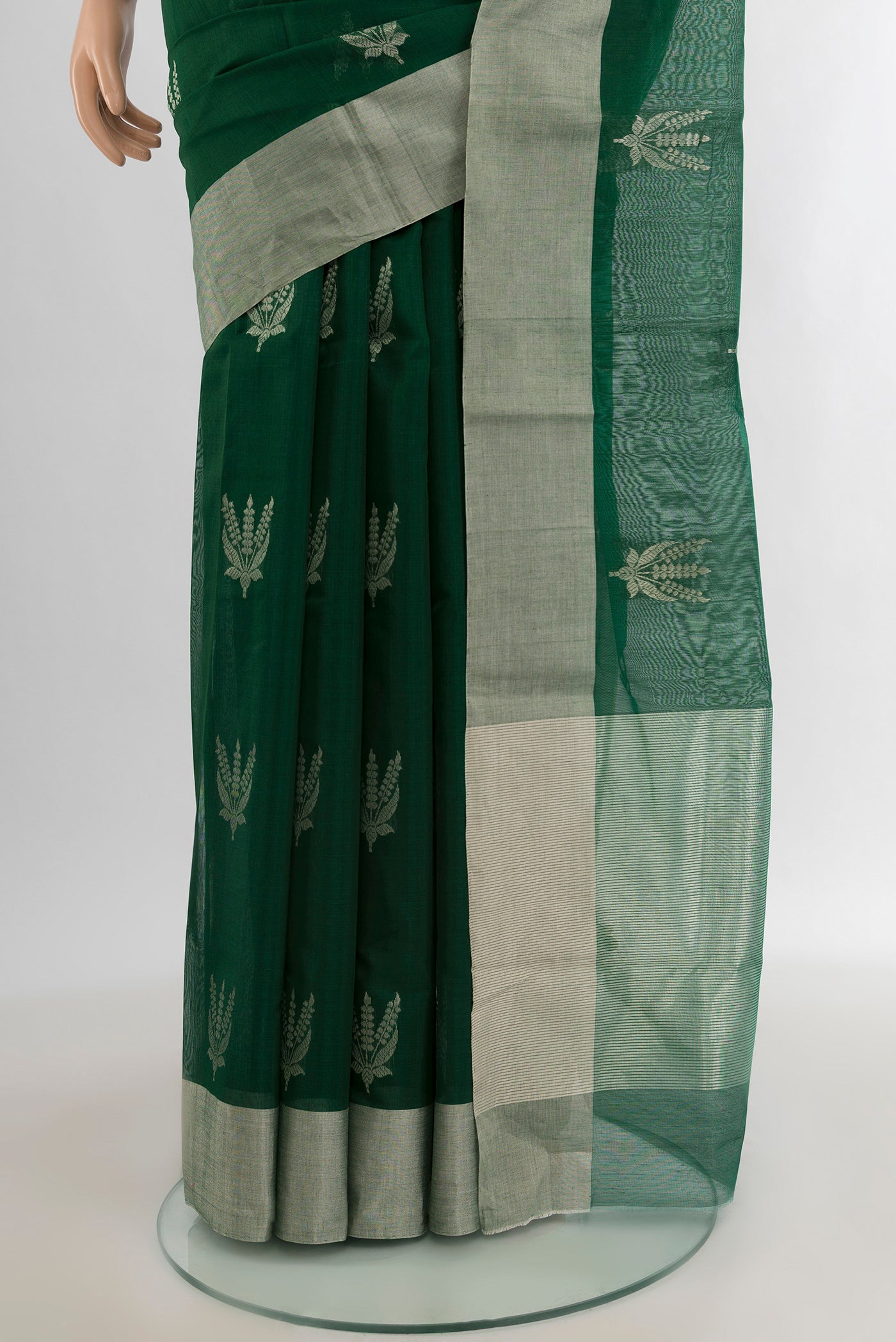 Pleats and pallu of Bottle Green Chanderi Silk Cotton Saree with Zari Butta on the body and Zari Border. 