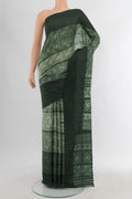 Bottle Green Tussar Silk Saree with Floral Print on the body and Plain Border.  displayed on a mannequin