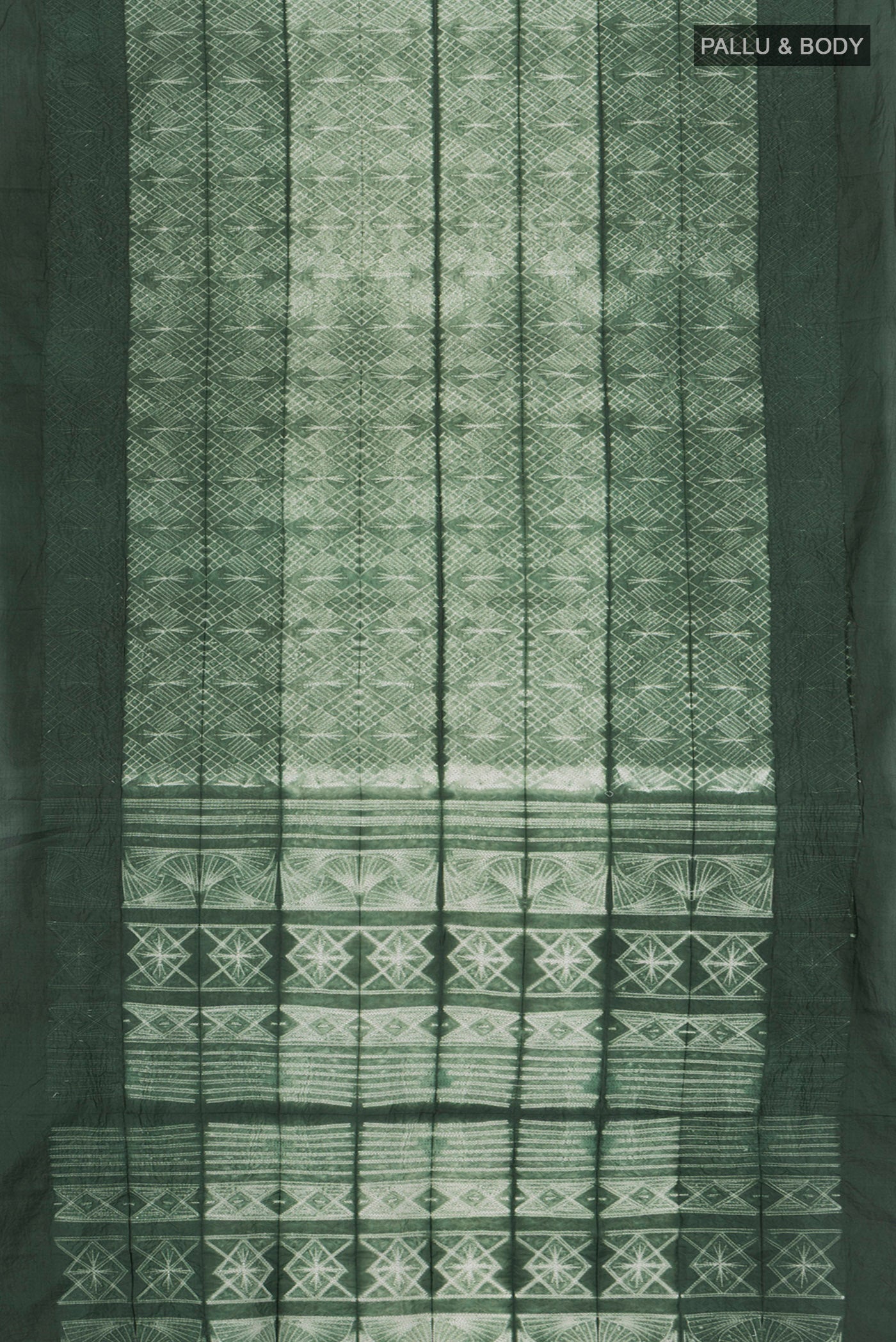 Flat view of Bottle Green Tussar Silk Saree with Floral Print on the body and Plain Border. 