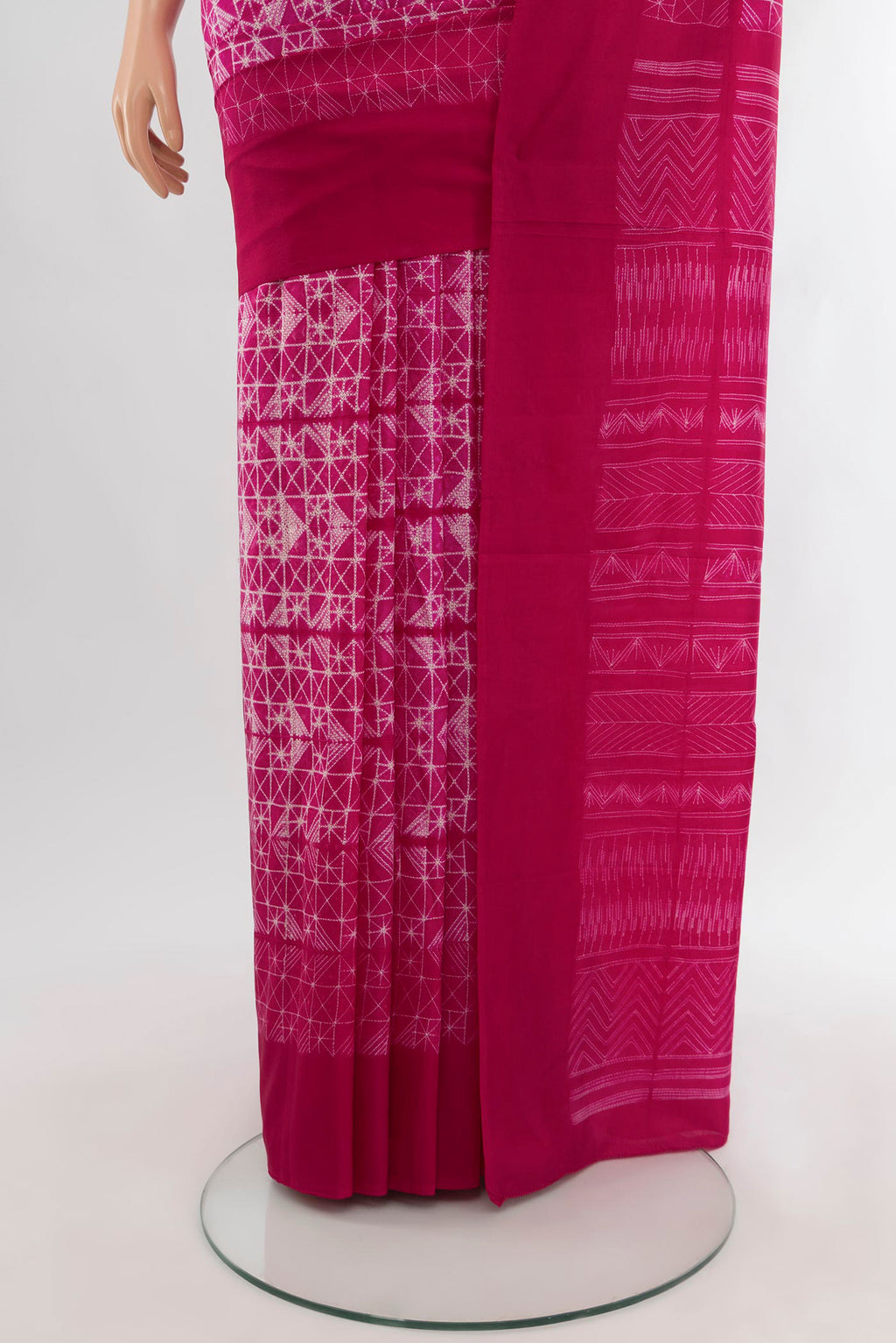 Pleats and pallu of Pink Tussar Silk Saree with Floral Print on the body and Temple Border. 