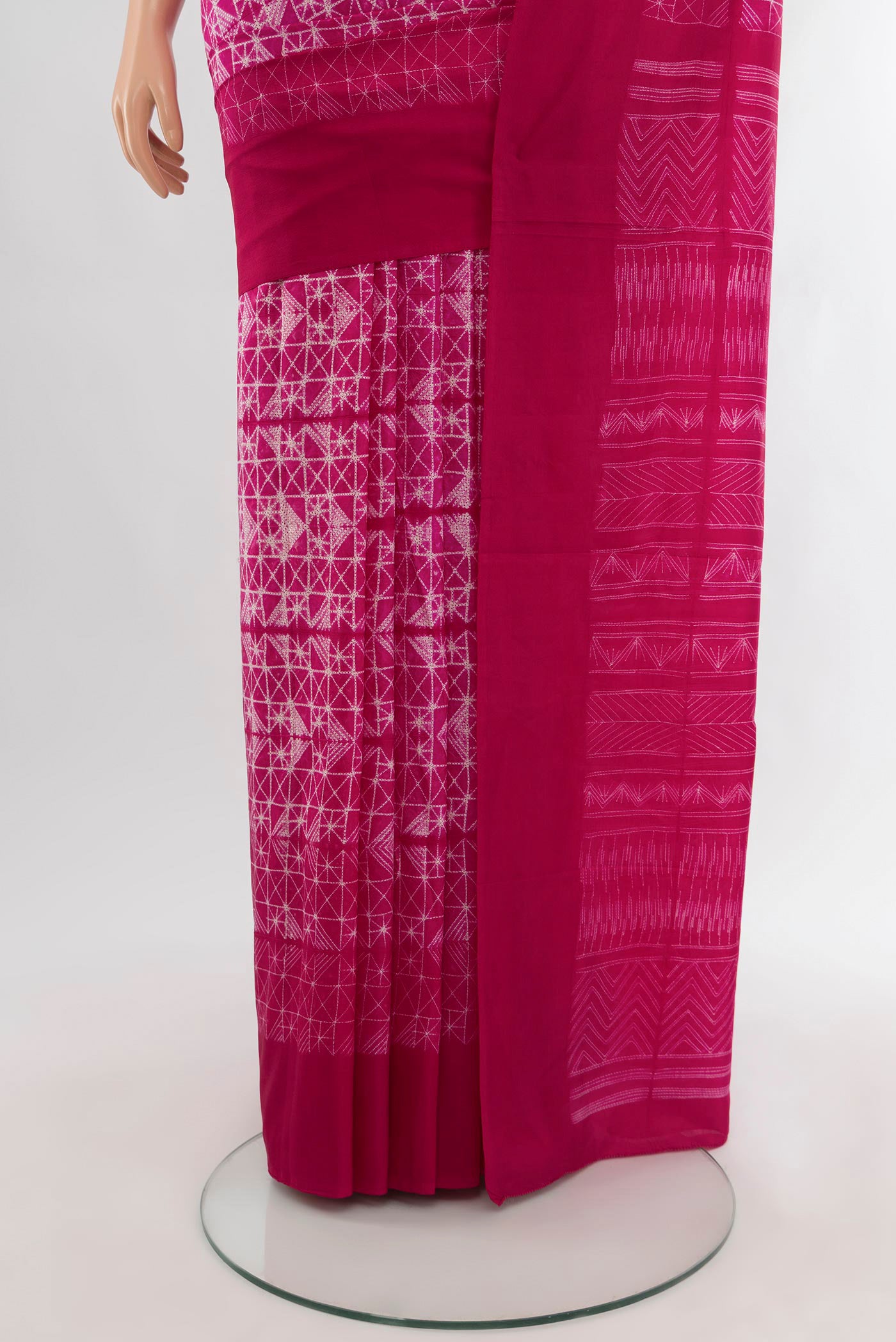Pleats and pallu of Pink Tussar Silk Saree with Floral Print on the body and Temple Border. 