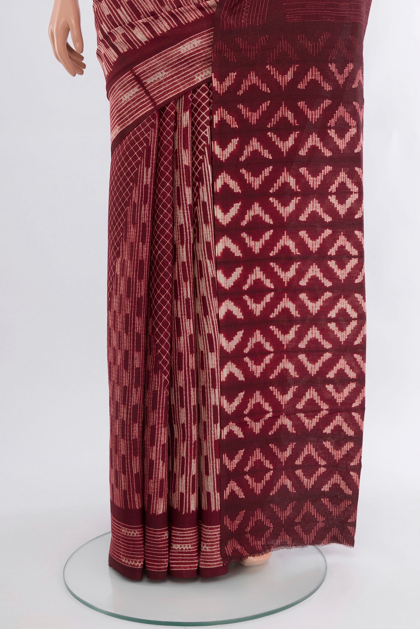 Pleats and pallu of Coffee Brown Tussar Silk Saree with Floral Print on the body and Printed Border. 