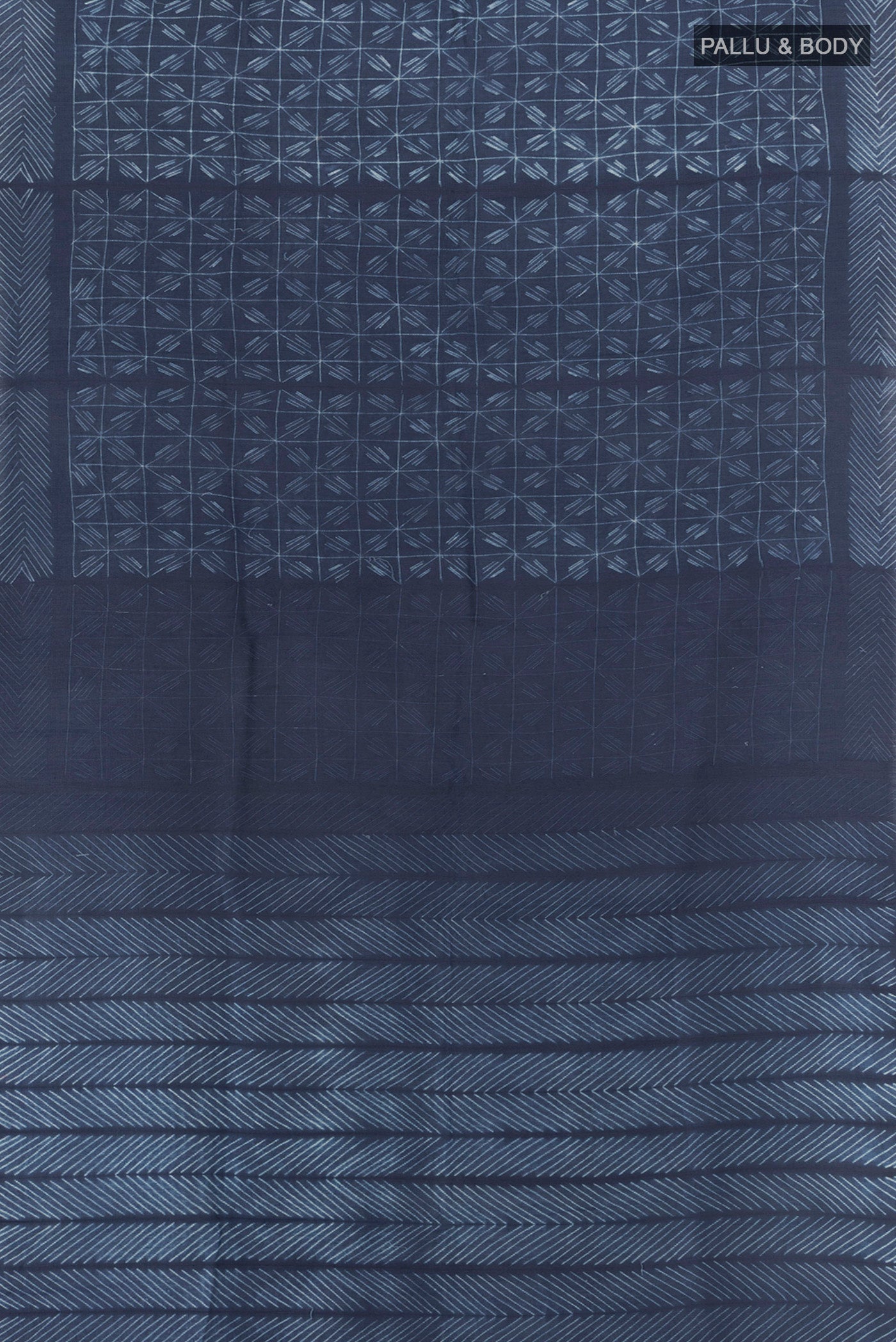 Flat view of Navy Blue Tussar Silk Saree with Printed design on the body and Printed Border. 