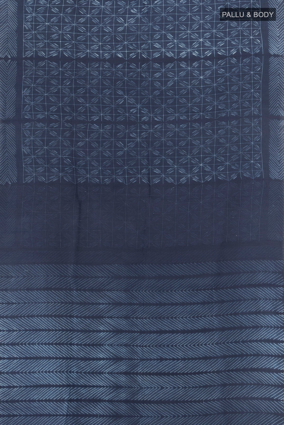 Flat view of Navy Blue Tussar Silk Saree with Printed design on the body and Printed Border. 