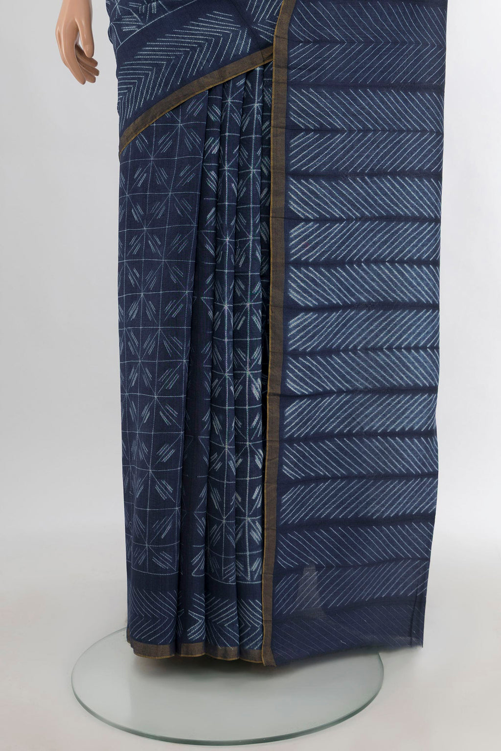 Pleats and pallu of Navy Blue Tussar Silk Saree with Printed design on the body and Printed Border. 