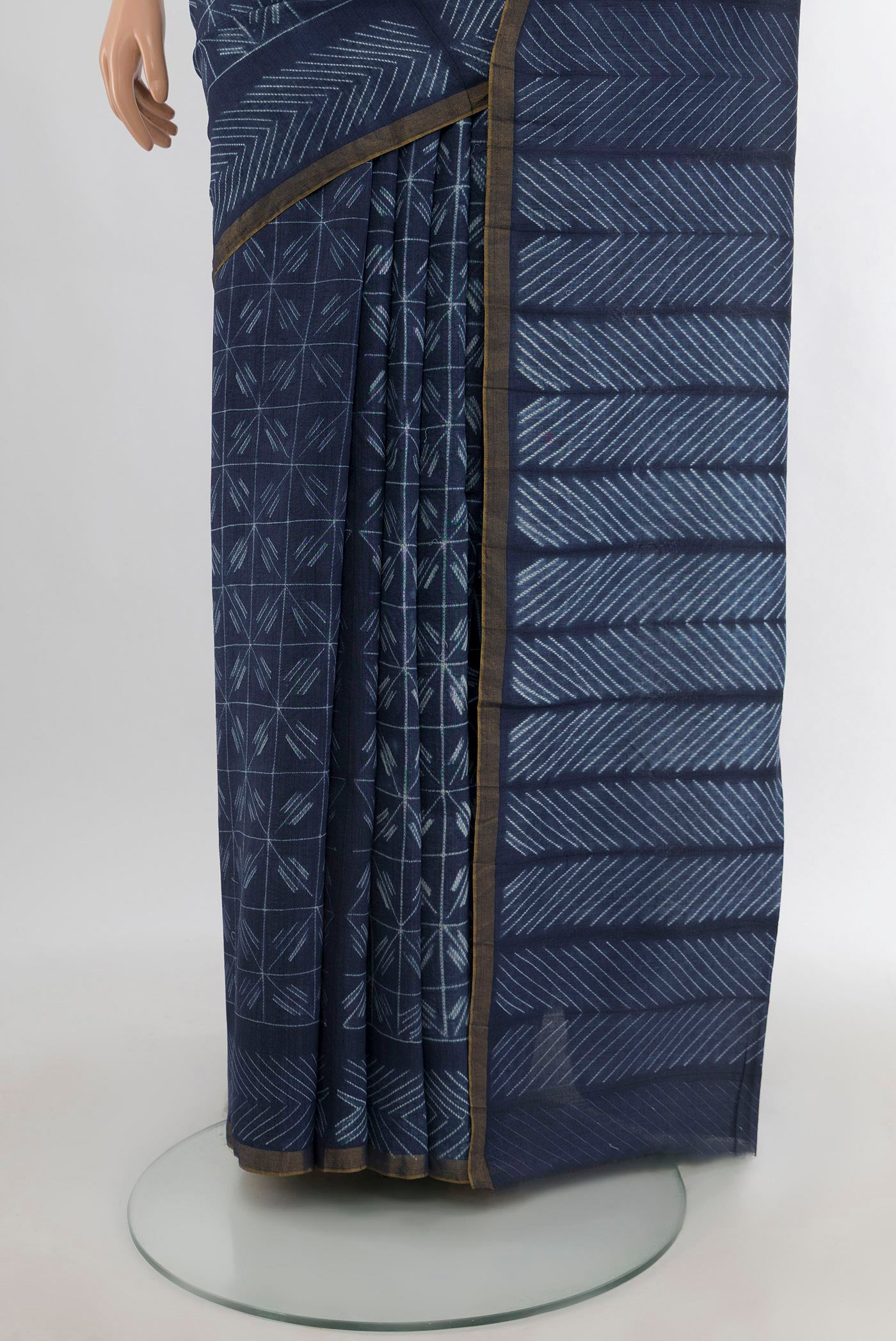 Pleats and pallu of Navy Blue Tussar Silk Saree with Printed design on the body and Printed Border. 