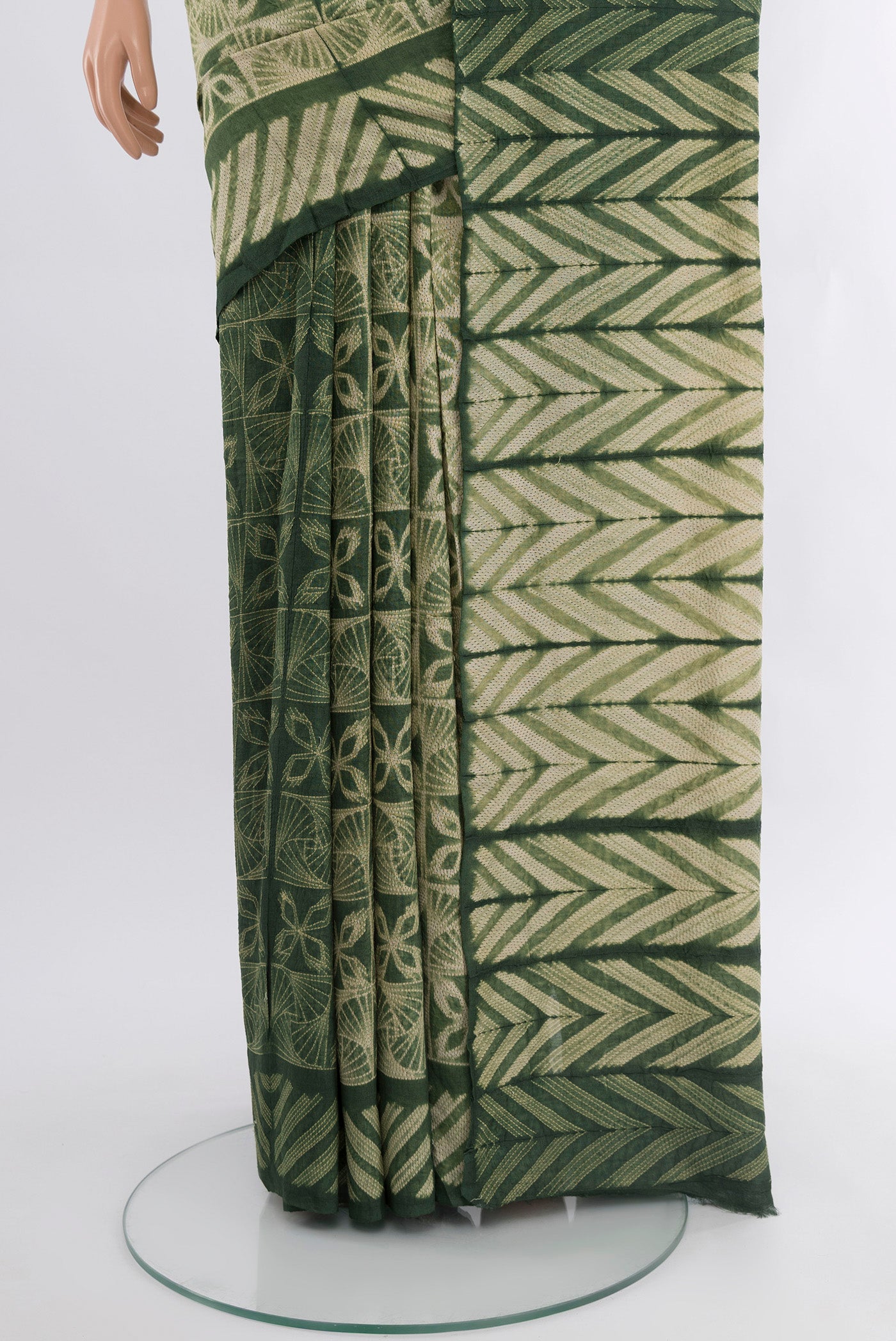 Pleats and pallu of Beige Tussar Silk Saree with Floral Print on the body and Printed Border. 