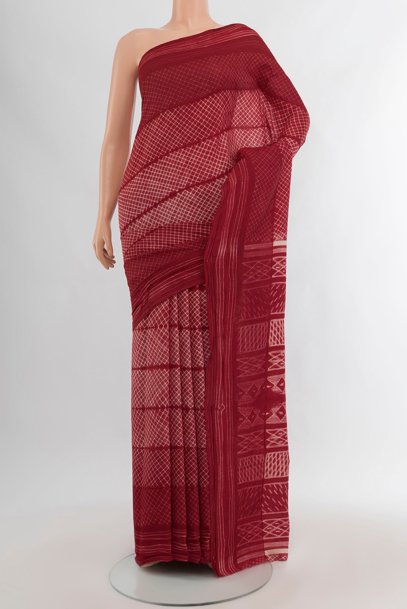 Maroon Tussar Silk Nine Yards Saree with Printed design on the body and Plain Border.  displayed on a mannequin