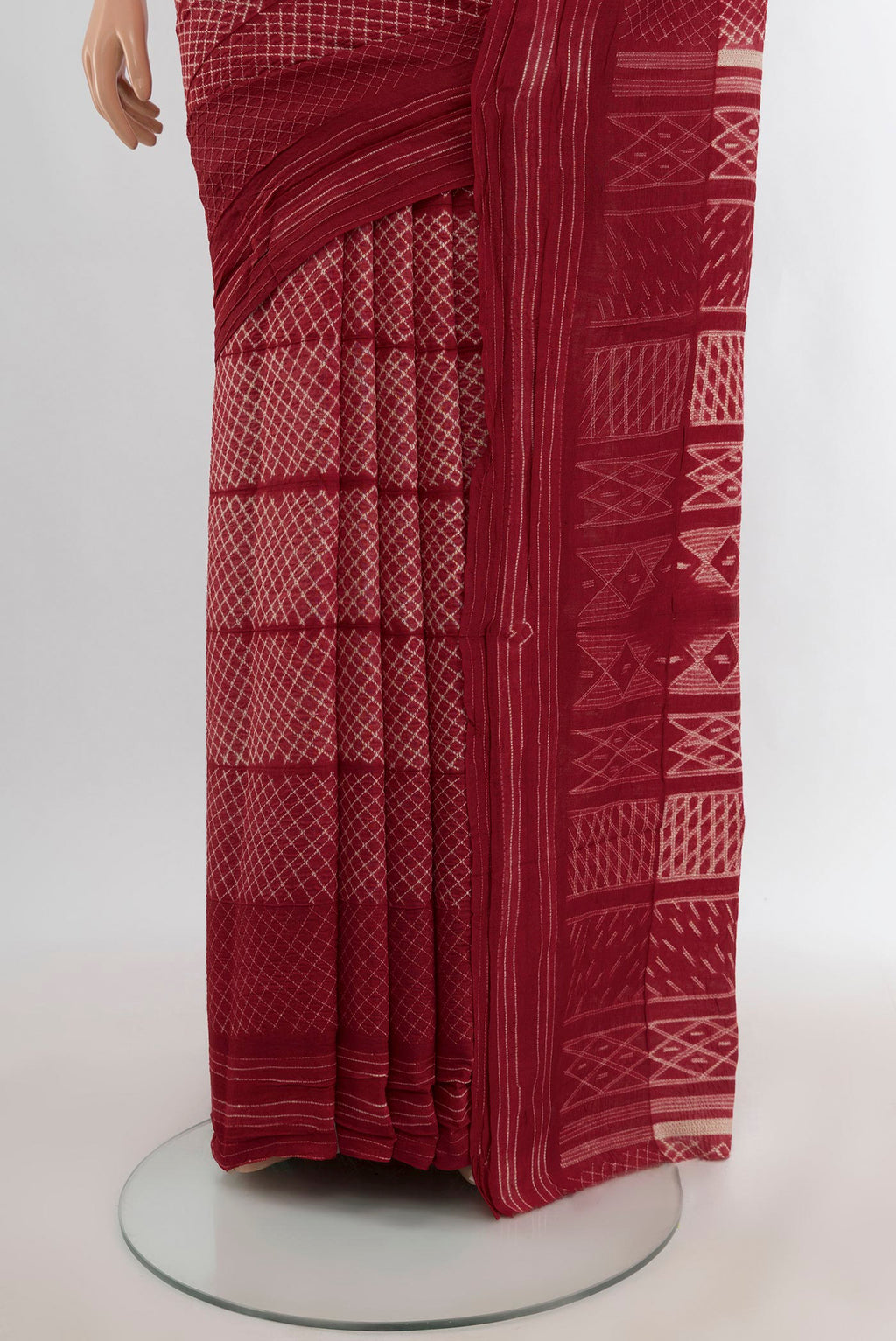 Pleats and pallu of Maroon Tussar Silk Nine Yards Saree with Printed design on the body and Plain Border. 