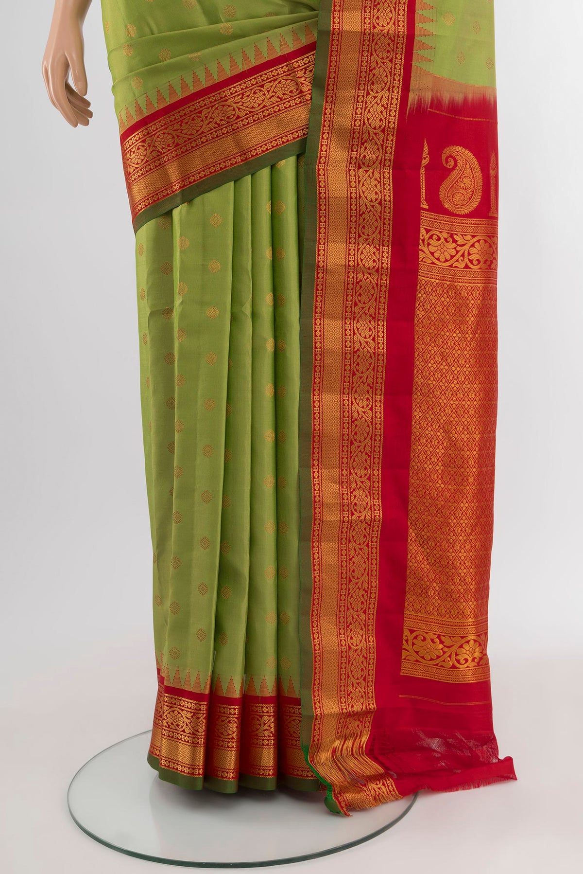 Pleats and pallu of Light Green Gadwal Silk Saree with Zari Butta on the body and Zari Border. 