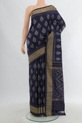 Navy Blue Pochampally Silk Saree with Pure Ikat on the body and Zari Border.  displayed on a mannequin
