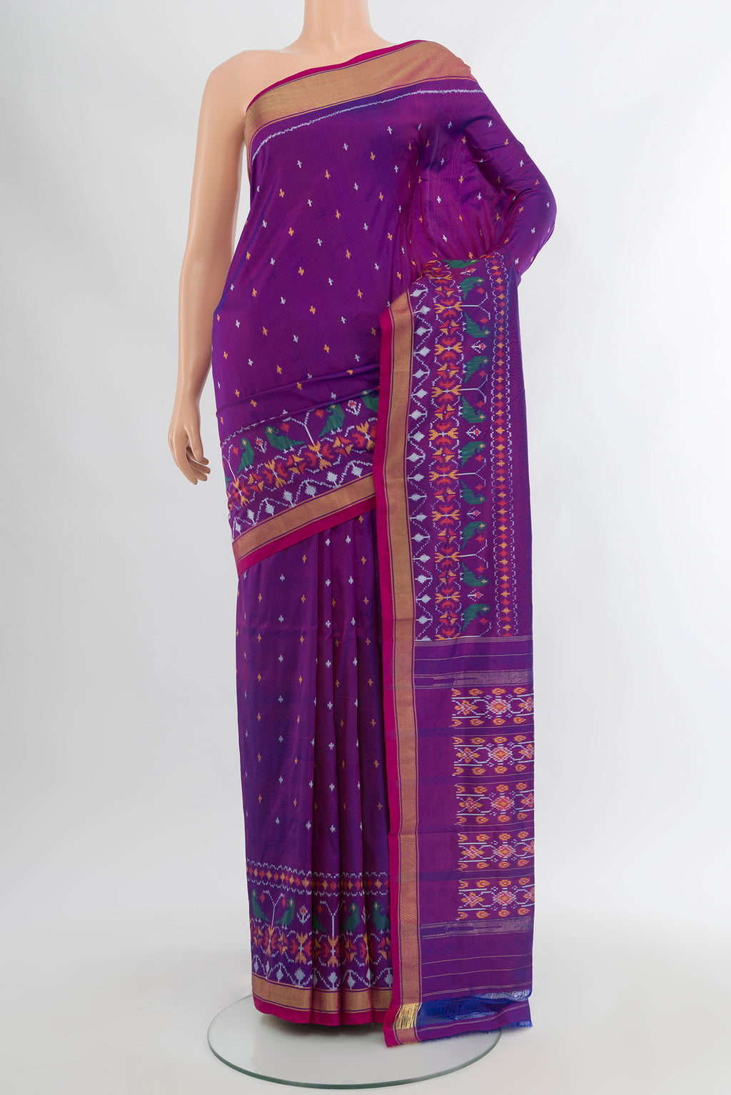 Magenta Pochampally Silk Saree with Ikat Print on the body and Silk Border.  displayed on a mannequin