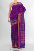 Magenta Pochampally Silk Saree with Ikat Print on the body and Silk Border.  displayed on a mannequin