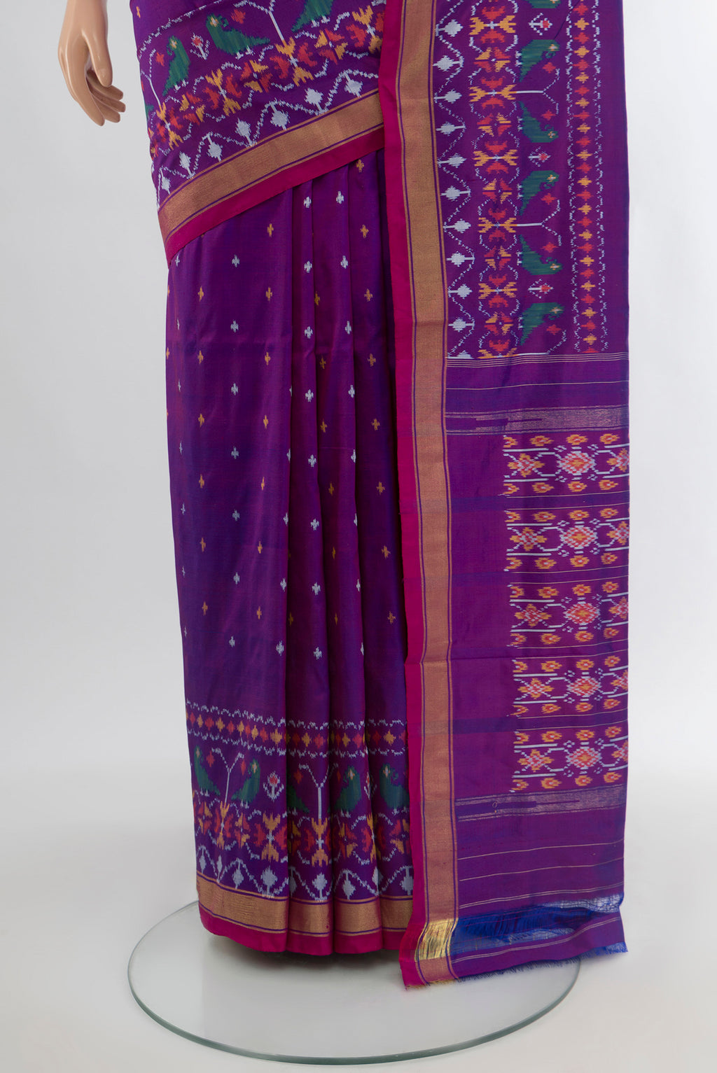 Pleats and pallu of Magenta Pochampally Silk Saree with Ikat Print on the body and Silk Border. 