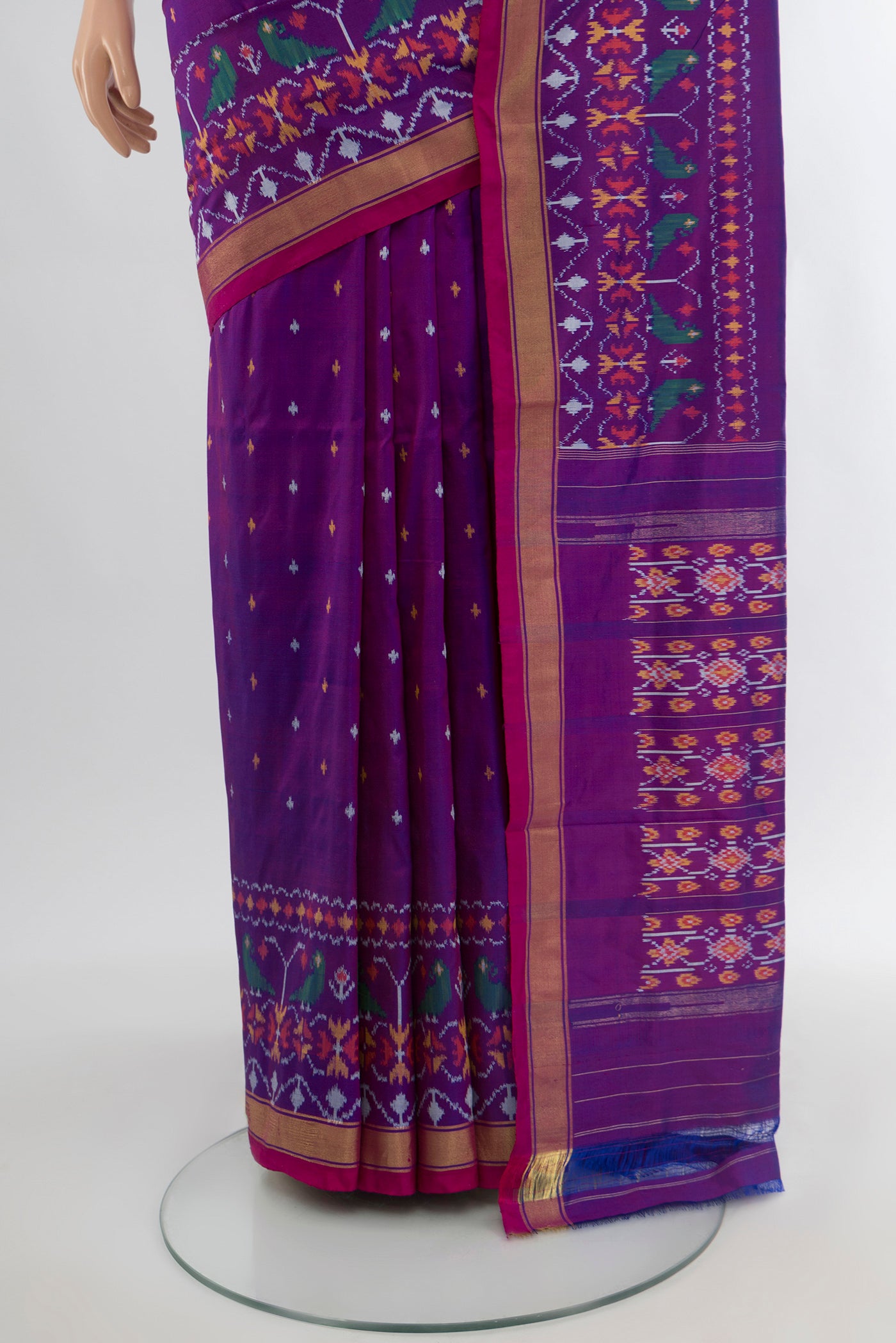 Pleats and pallu of Magenta Pochampally Silk Saree with Ikat Print on the body and Silk Border. 