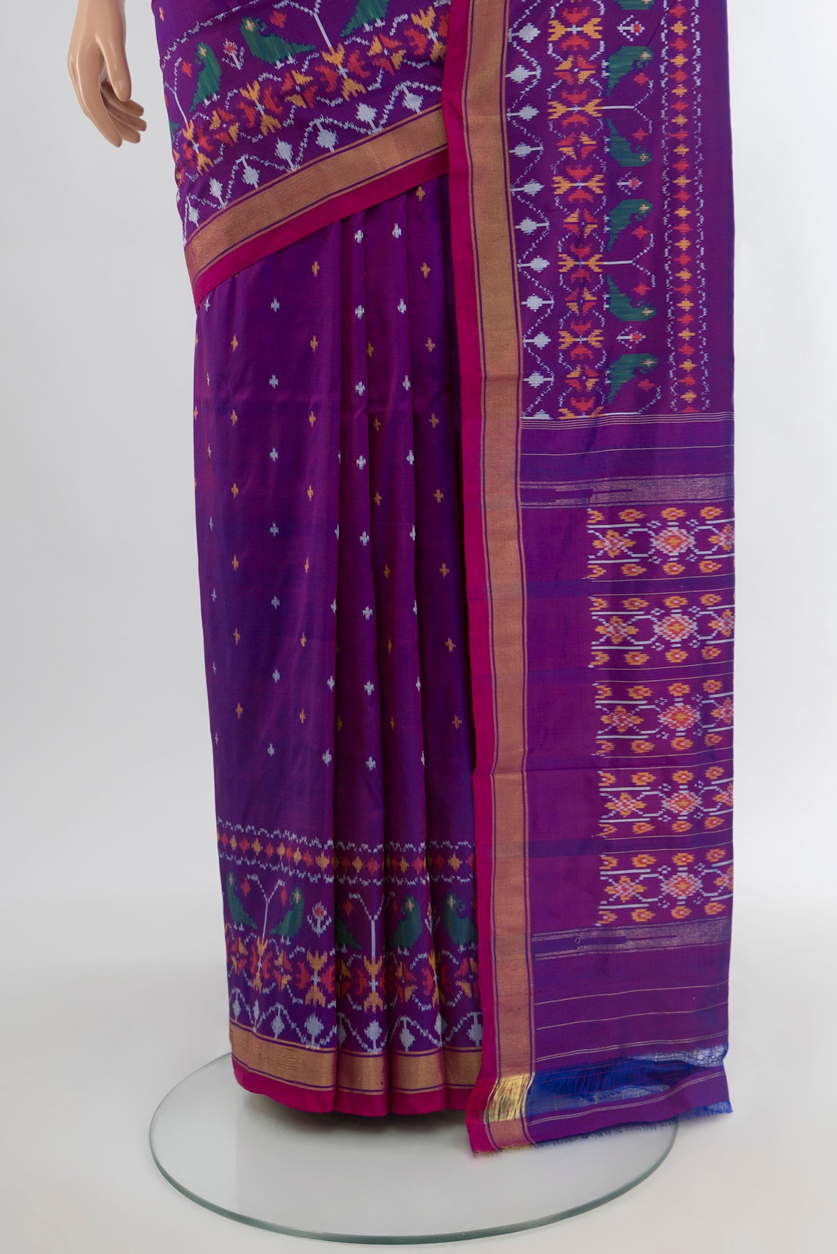Pleats and pallu of Magenta Pochampally Silk Saree with Ikat Print on the body and Silk Border. 