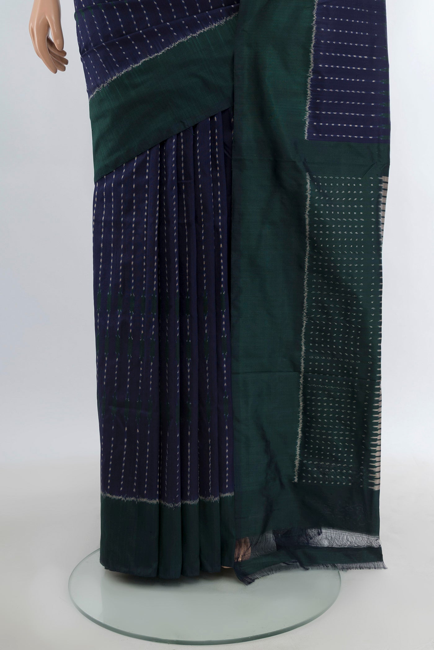Pleats and pallu of Navy Blue Pochampally Silk Saree with Pure Ikat on the body and Plain Border. 